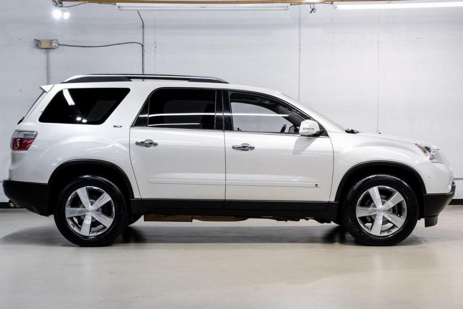 2009 White Diamond Tricoat /Ebony GMC Acadia SLT-2 (1GKER33D19J) with an 3.6L V6 SIDI engine, Automatic transmission, located at 15300 Midway Rd., Addison, TX, 75001, (972) 702-0011, 32.958321, -96.838074 - 2009 GMC Acadia SLT-2<br><br>Now Available at Midway Auto Group, Addison, Texas<br><br>Premium, spacious, and family-readythe 2009 GMC Acadia SLT-2 delivers upscale features, three-row flexibility, and strong V6 performance. As one of the highest trim levels available, the SLT-2 offers luxury-grade - Photo#8