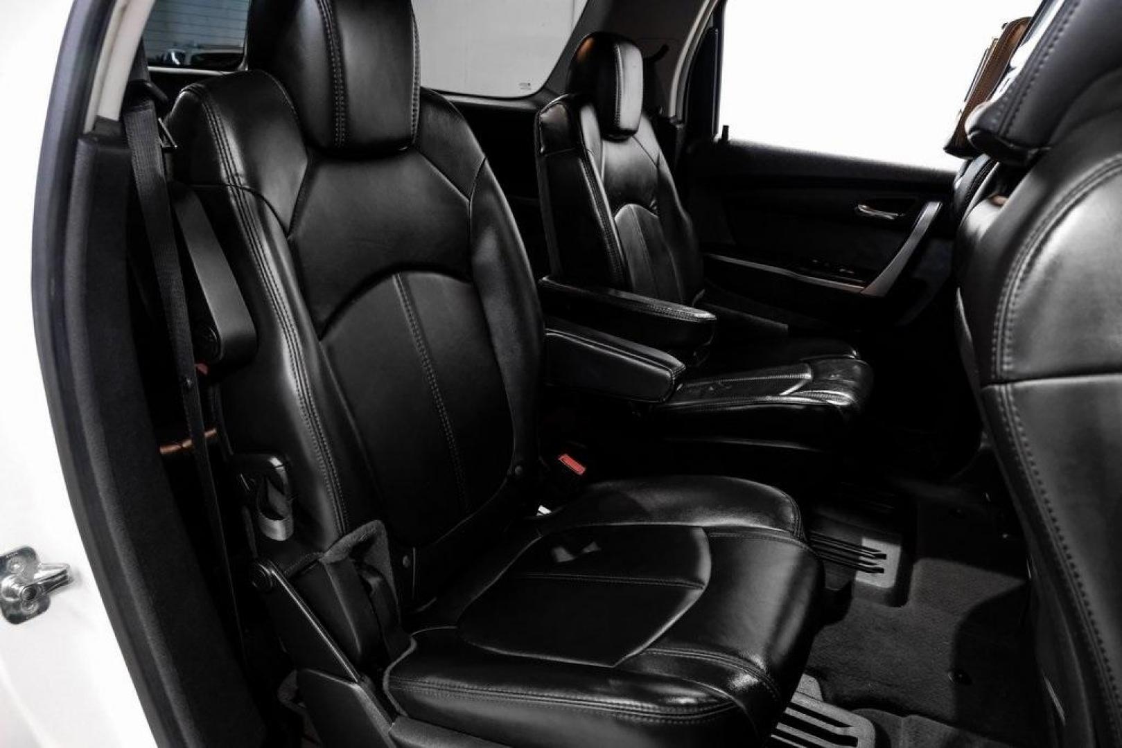 2009 White Diamond Tricoat /Ebony GMC Acadia SLT-2 (1GKER33D19J) with an 3.6L V6 SIDI engine, Automatic transmission, located at 15300 Midway Rd., Addison, TX, 75001, (972) 702-0011, 32.958321, -96.838074 - 2009 GMC Acadia SLT-2<br><br>Now Available at Midway Auto Group, Addison, Texas<br><br>Premium, spacious, and family-readythe 2009 GMC Acadia SLT-2 delivers upscale features, three-row flexibility, and strong V6 performance. As one of the highest trim levels available, the SLT-2 offers luxury-grade - Photo#46