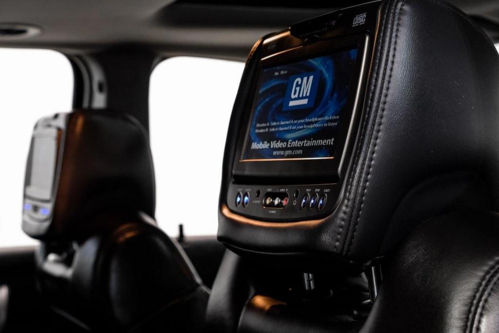 2009 White Diamond Tricoat /Ebony GMC Acadia SLT-2 (1GKER33D19J) with an 3.6L V6 SIDI engine, Automatic transmission, located at 15300 Midway Rd., Addison, TX, 75001, (972) 702-0011, 32.958321, -96.838074 - 2009 GMC Acadia SLT-2<br><br>Now Available at Midway Auto Group, Addison, Texas<br><br>Premium, spacious, and family-readythe 2009 GMC Acadia SLT-2 delivers upscale features, three-row flexibility, and strong V6 performance. As one of the highest trim levels available, the SLT-2 offers luxury-grade - Photo#49