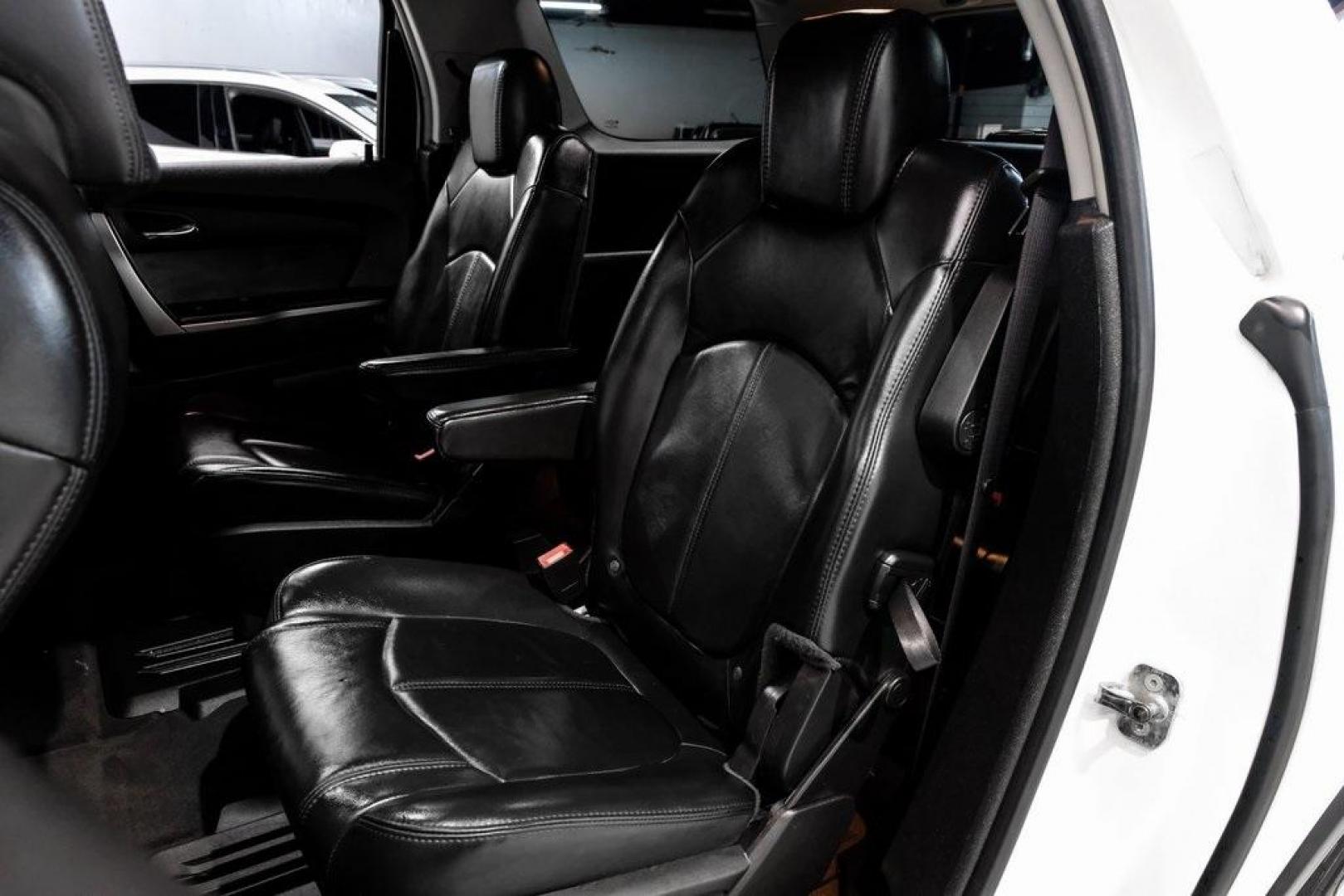 2009 White Diamond Tricoat /Ebony GMC Acadia SLT-2 (1GKER33D19J) with an 3.6L V6 SIDI engine, Automatic transmission, located at 15300 Midway Rd., Addison, TX, 75001, (972) 702-0011, 32.958321, -96.838074 - 2009 GMC Acadia SLT-2<br><br>Now Available at Midway Auto Group, Addison, Texas<br><br>Premium, spacious, and family-readythe 2009 GMC Acadia SLT-2 delivers upscale features, three-row flexibility, and strong V6 performance. As one of the highest trim levels available, the SLT-2 offers luxury-grade - Photo#53