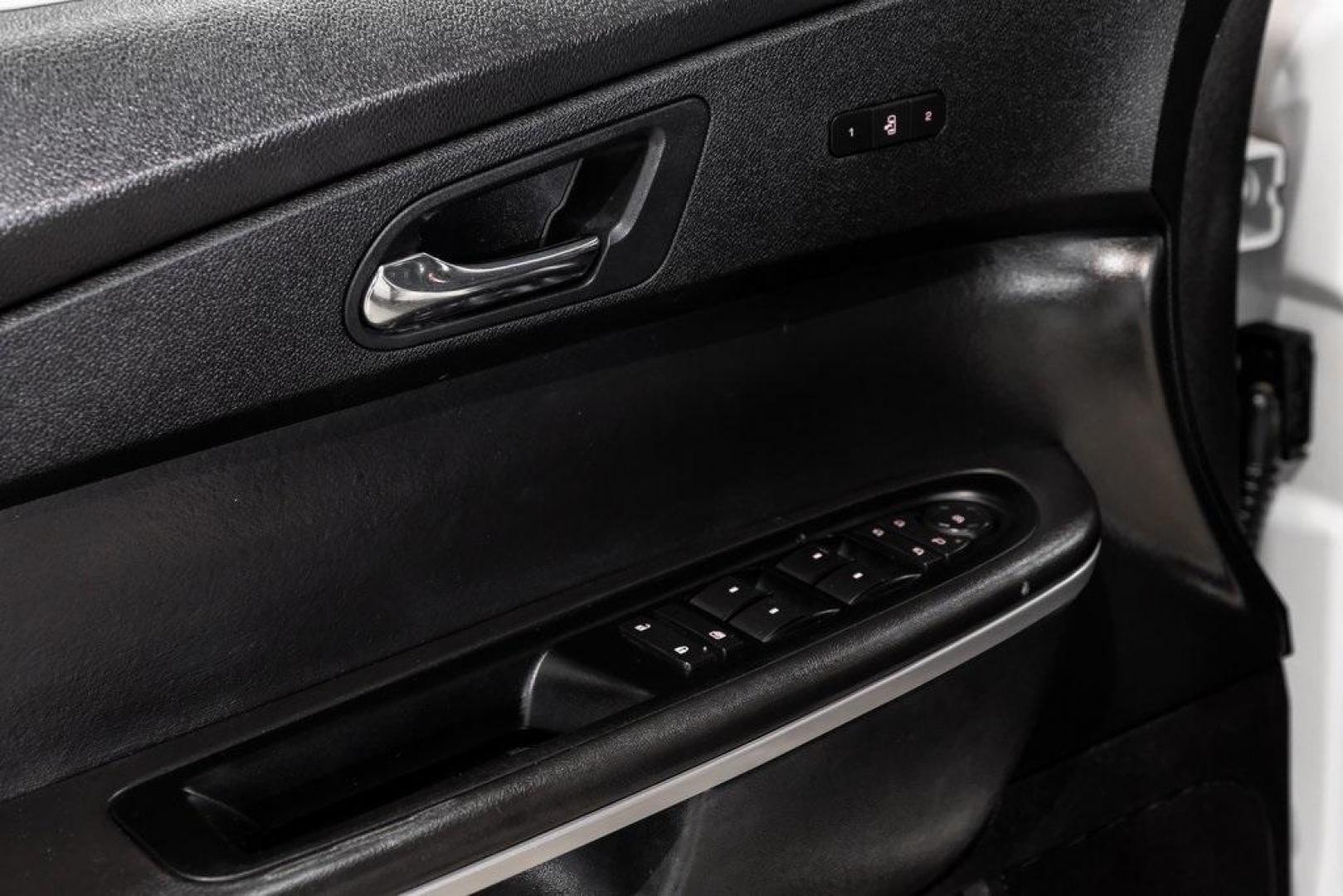 2009 White Diamond Tricoat /Ebony GMC Acadia SLT-2 (1GKER33D19J) with an 3.6L V6 SIDI engine, Automatic transmission, located at 15300 Midway Rd., Addison, TX, 75001, (972) 702-0011, 32.958321, -96.838074 - 2009 GMC Acadia SLT-2<br><br>Now Available at Midway Auto Group, Addison, Texas<br><br>Premium, spacious, and family-readythe 2009 GMC Acadia SLT-2 delivers upscale features, three-row flexibility, and strong V6 performance. As one of the highest trim levels available, the SLT-2 offers luxury-grade - Photo#59