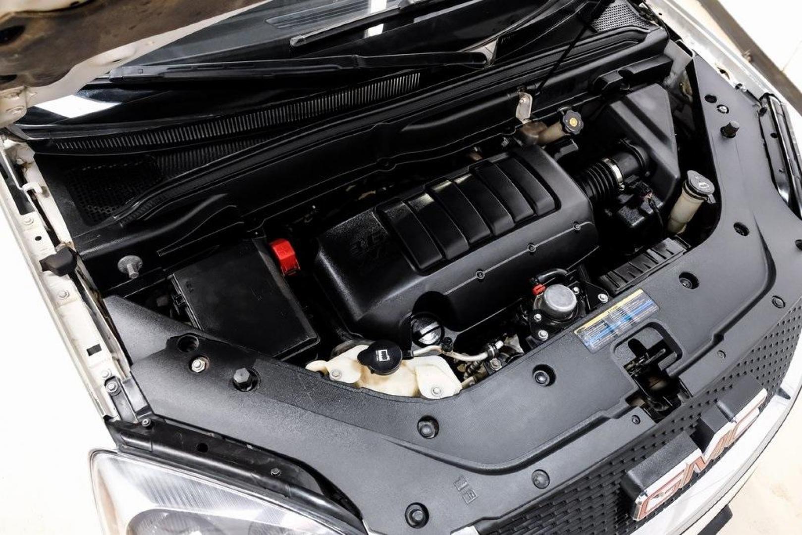 2009 White Diamond Tricoat /Ebony GMC Acadia SLT-2 (1GKER33D19J) with an 3.6L V6 SIDI engine, Automatic transmission, located at 15300 Midway Rd., Addison, TX, 75001, (972) 702-0011, 32.958321, -96.838074 - 2009 GMC Acadia SLT-2<br><br>Now Available at Midway Auto Group, Addison, Texas<br><br>Premium, spacious, and family-readythe 2009 GMC Acadia SLT-2 delivers upscale features, three-row flexibility, and strong V6 performance. As one of the highest trim levels available, the SLT-2 offers luxury-grade - Photo#66