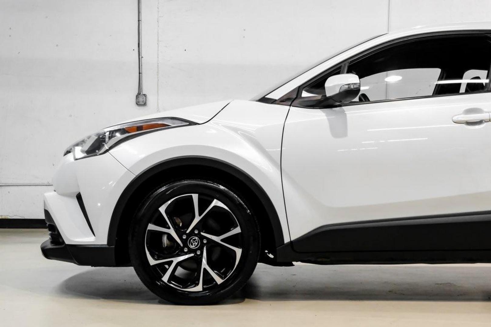 2019 Blizzard Pearl /Black Toyota C-HR XLE (NMTKHMBX6KR) with an 2.0L I4 DOHC 16V engine, CVT transmission, located at 15300 Midway Rd., Addison, TX, 75001, (972) 702-0011, 32.958321, -96.838074 - Photo#18