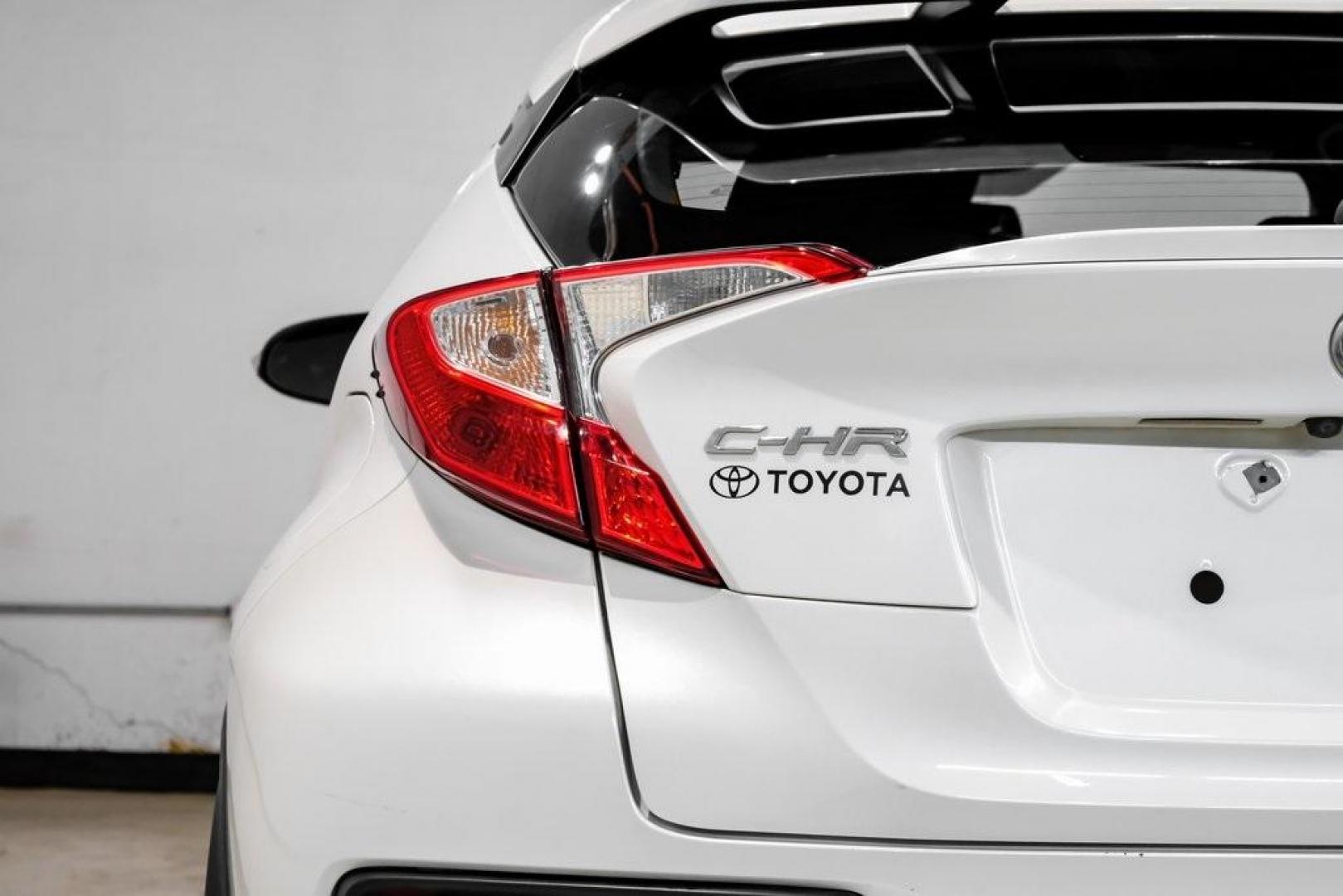 2019 Blizzard Pearl /Black Toyota C-HR XLE (NMTKHMBX6KR) with an 2.0L I4 DOHC 16V engine, CVT transmission, located at 15300 Midway Rd., Addison, TX, 75001, (972) 702-0011, 32.958321, -96.838074 - Photo#52