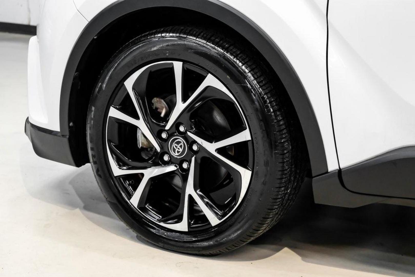 2019 Blizzard Pearl /Black Toyota C-HR XLE (NMTKHMBX6KR) with an 2.0L I4 DOHC 16V engine, CVT transmission, located at 15300 Midway Rd., Addison, TX, 75001, (972) 702-0011, 32.958321, -96.838074 - Photo#61