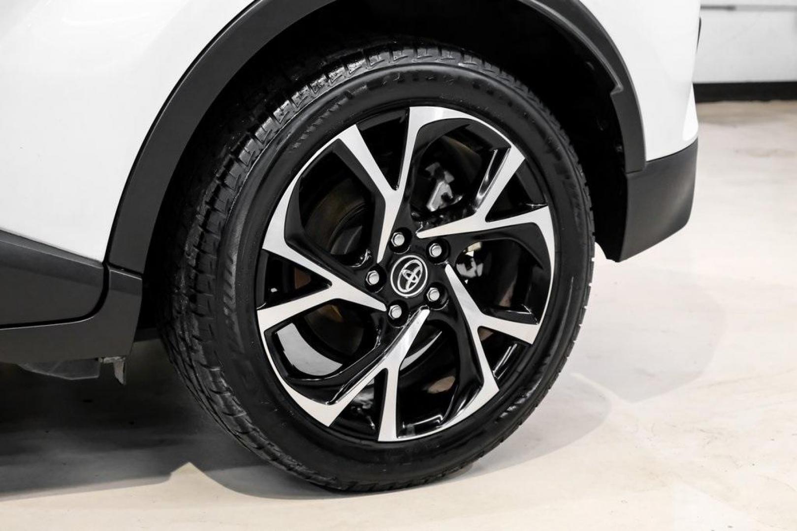 2019 Blizzard Pearl /Black Toyota C-HR XLE (NMTKHMBX6KR) with an 2.0L I4 DOHC 16V engine, CVT transmission, located at 15300 Midway Rd., Addison, TX, 75001, (972) 702-0011, 32.958321, -96.838074 - Photo#62