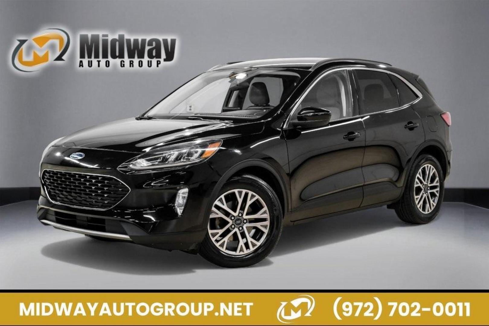 2021 Black Metallic /Sandstone Ford Escape SEL (1FMCU0H62MU) with an 1.5L EcoBoost engine, Automatic transmission, located at 15300 Midway Rd., Addison, TX, 75001, (972) 702-0011, 32.958321, -96.838074 - Photo#0