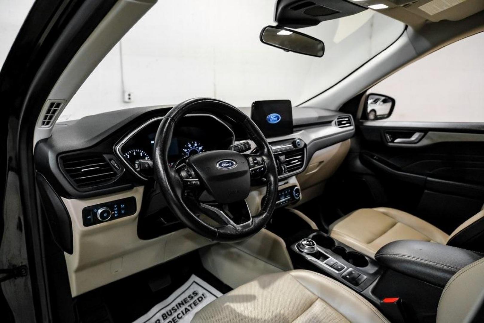 2021 Black Metallic /Sandstone Ford Escape SEL (1FMCU0H62MU) with an 1.5L EcoBoost engine, Automatic transmission, located at 15300 Midway Rd., Addison, TX, 75001, (972) 702-0011, 32.958321, -96.838074 - Photo#2