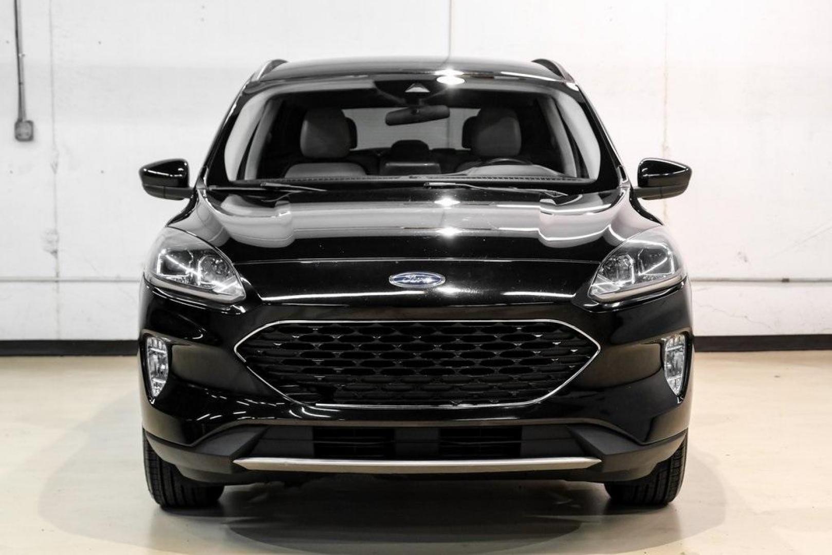 2021 Black Metallic /Sandstone Ford Escape SEL (1FMCU0H62MU) with an 1.5L EcoBoost engine, Automatic transmission, located at 15300 Midway Rd., Addison, TX, 75001, (972) 702-0011, 32.958321, -96.838074 - Photo#4