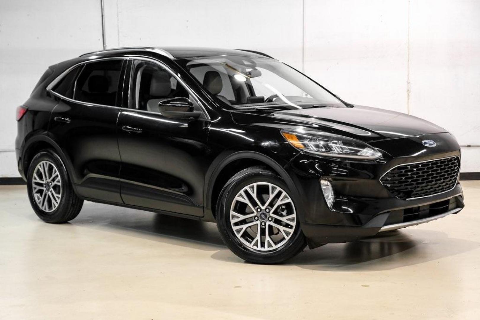 2021 Black Metallic /Sandstone Ford Escape SEL (1FMCU0H62MU) with an 1.5L EcoBoost engine, Automatic transmission, located at 15300 Midway Rd., Addison, TX, 75001, (972) 702-0011, 32.958321, -96.838074 - Photo#5