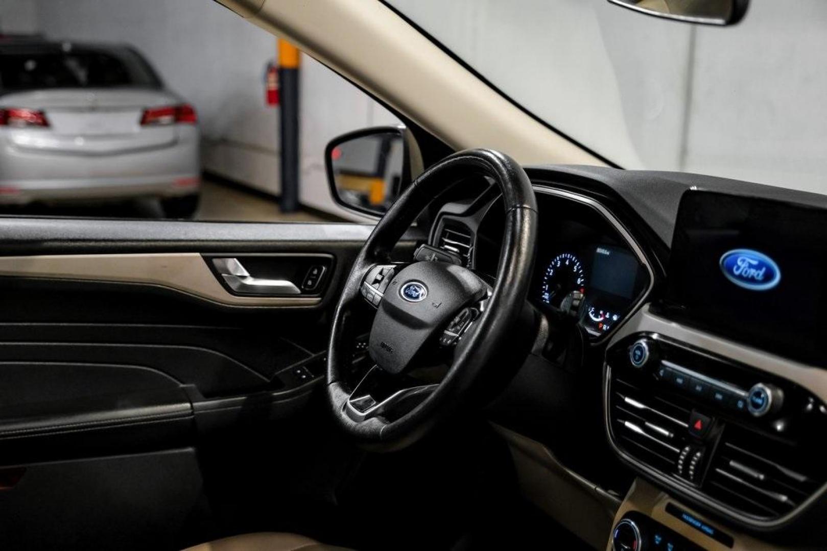 2021 Black Metallic /Sandstone Ford Escape SEL (1FMCU0H62MU) with an 1.5L EcoBoost engine, Automatic transmission, located at 15300 Midway Rd., Addison, TX, 75001, (972) 702-0011, 32.958321, -96.838074 - Photo#13