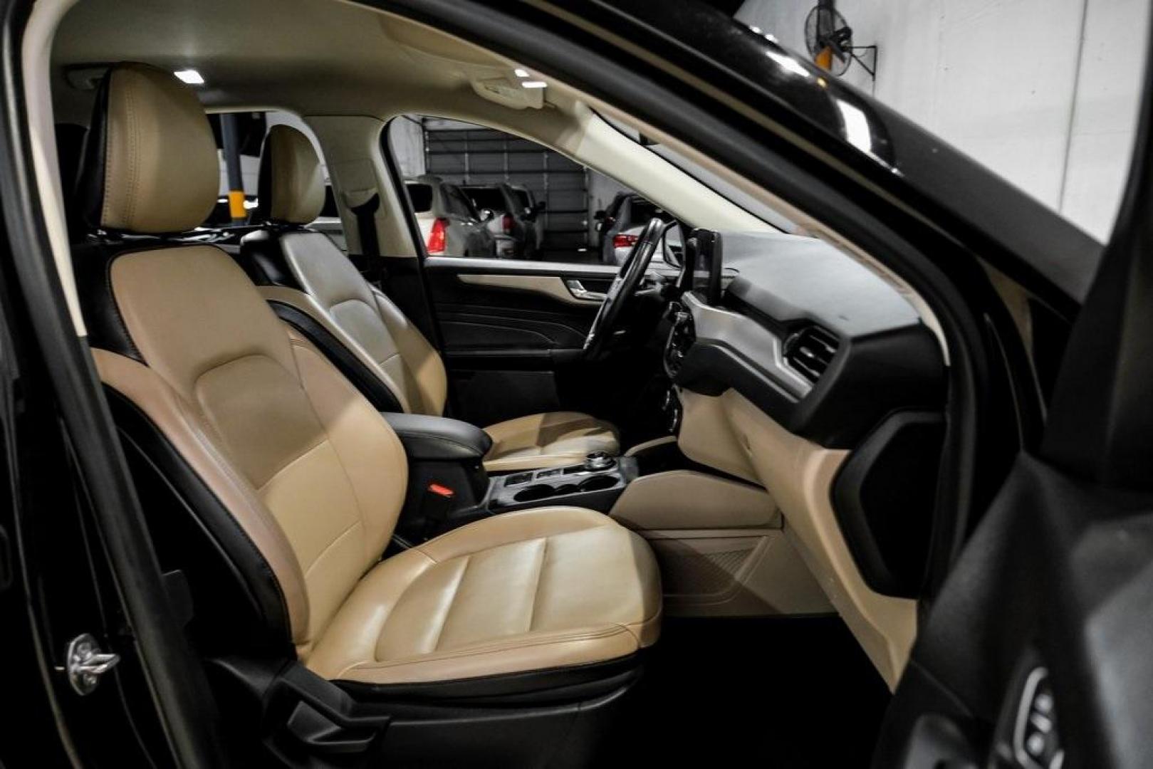 2021 Black Metallic /Sandstone Ford Escape SEL (1FMCU0H62MU) with an 1.5L EcoBoost engine, Automatic transmission, located at 15300 Midway Rd., Addison, TX, 75001, (972) 702-0011, 32.958321, -96.838074 - Photo#27