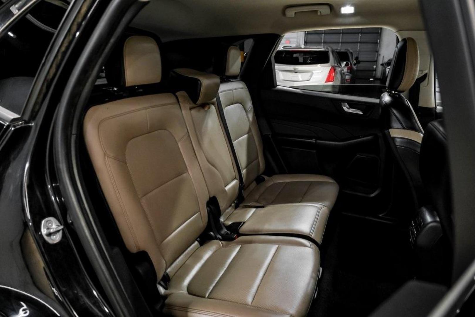 2021 Black Metallic /Sandstone Ford Escape SEL (1FMCU0H62MU) with an 1.5L EcoBoost engine, Automatic transmission, located at 15300 Midway Rd., Addison, TX, 75001, (972) 702-0011, 32.958321, -96.838074 - Photo#29