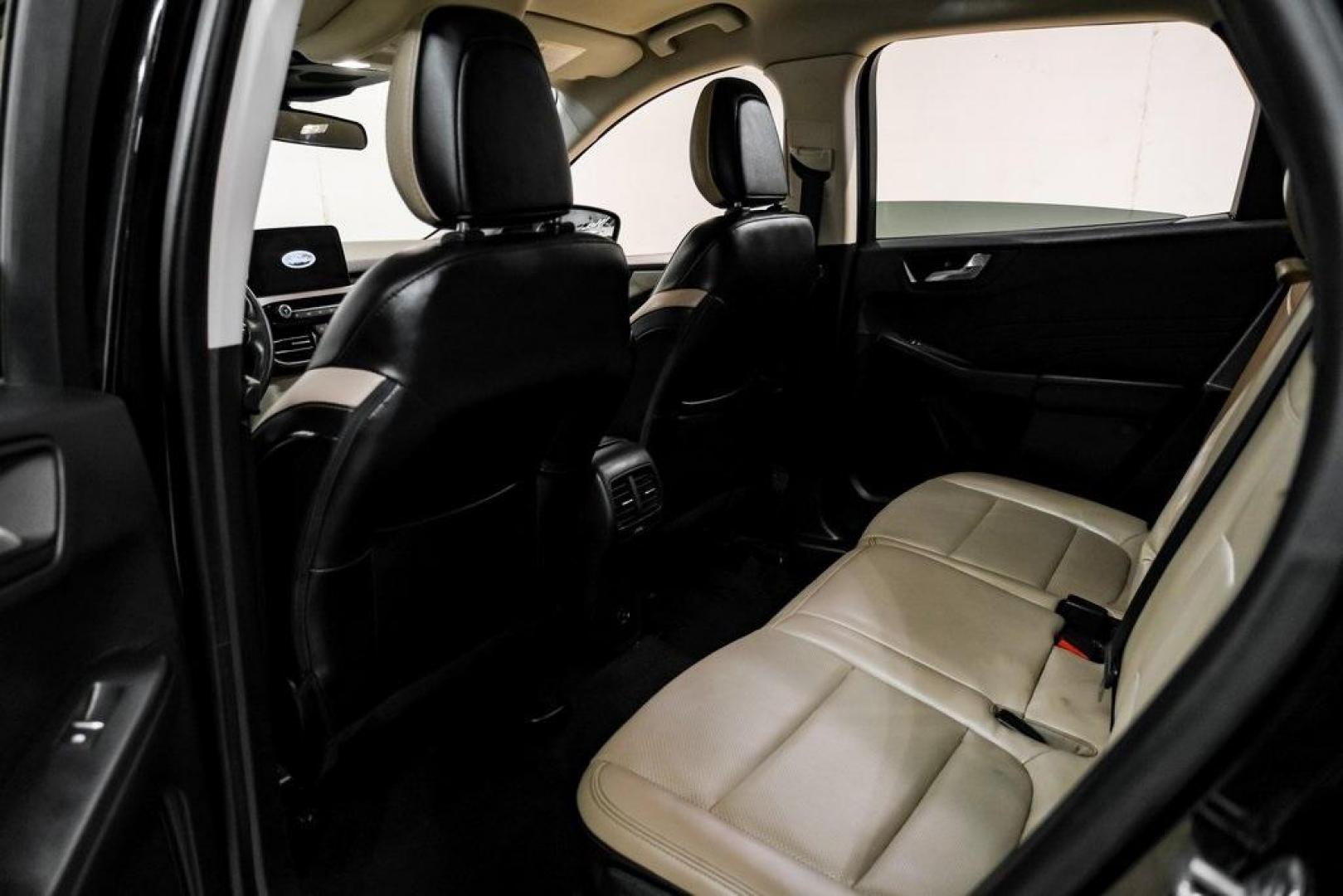 2021 Black Metallic /Sandstone Ford Escape SEL (1FMCU0H62MU) with an 1.5L EcoBoost engine, Automatic transmission, located at 15300 Midway Rd., Addison, TX, 75001, (972) 702-0011, 32.958321, -96.838074 - Photo#31