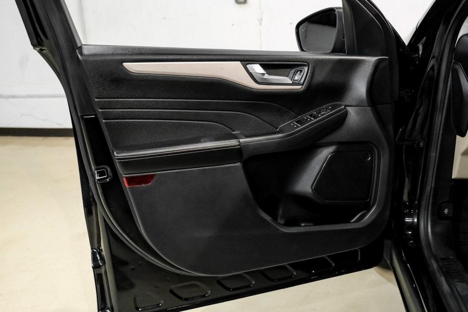 2021 Black Metallic /Sandstone Ford Escape SEL (1FMCU0H62MU) with an 1.5L EcoBoost engine, Automatic transmission, located at 15300 Midway Rd., Addison, TX, 75001, (972) 702-0011, 32.958321, -96.838074 - Photo#35