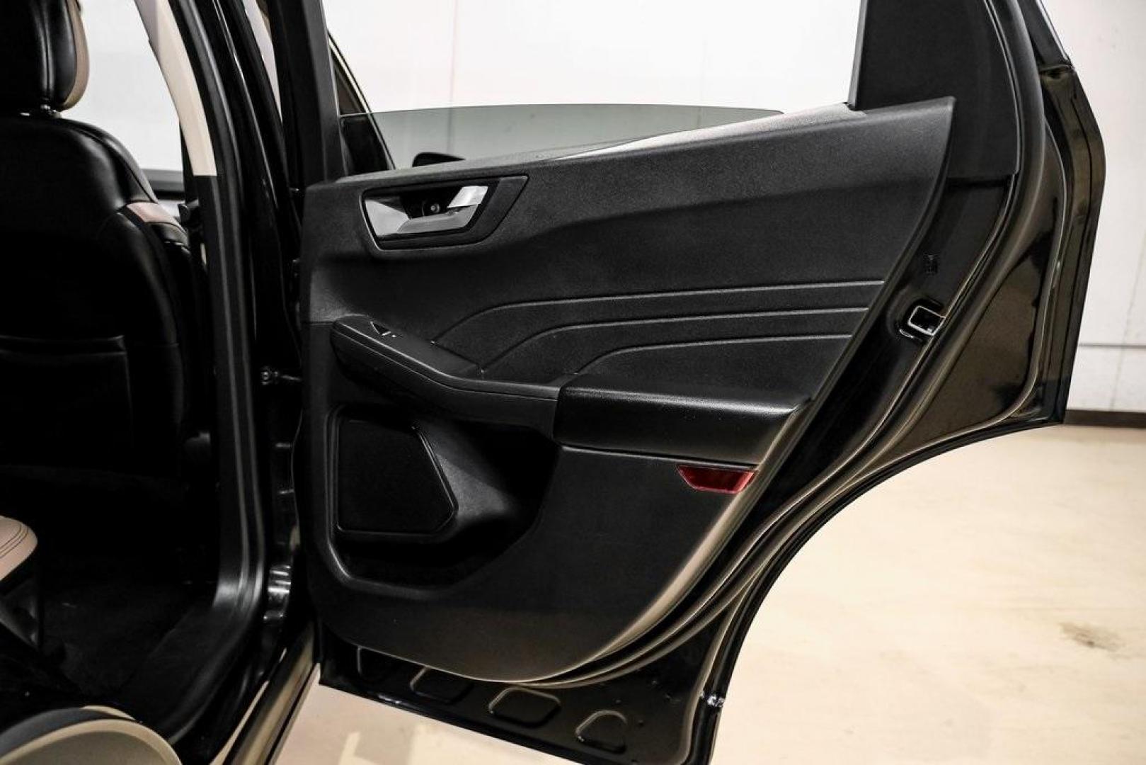 2021 Black Metallic /Sandstone Ford Escape SEL (1FMCU0H62MU) with an 1.5L EcoBoost engine, Automatic transmission, located at 15300 Midway Rd., Addison, TX, 75001, (972) 702-0011, 32.958321, -96.838074 - Photo#39