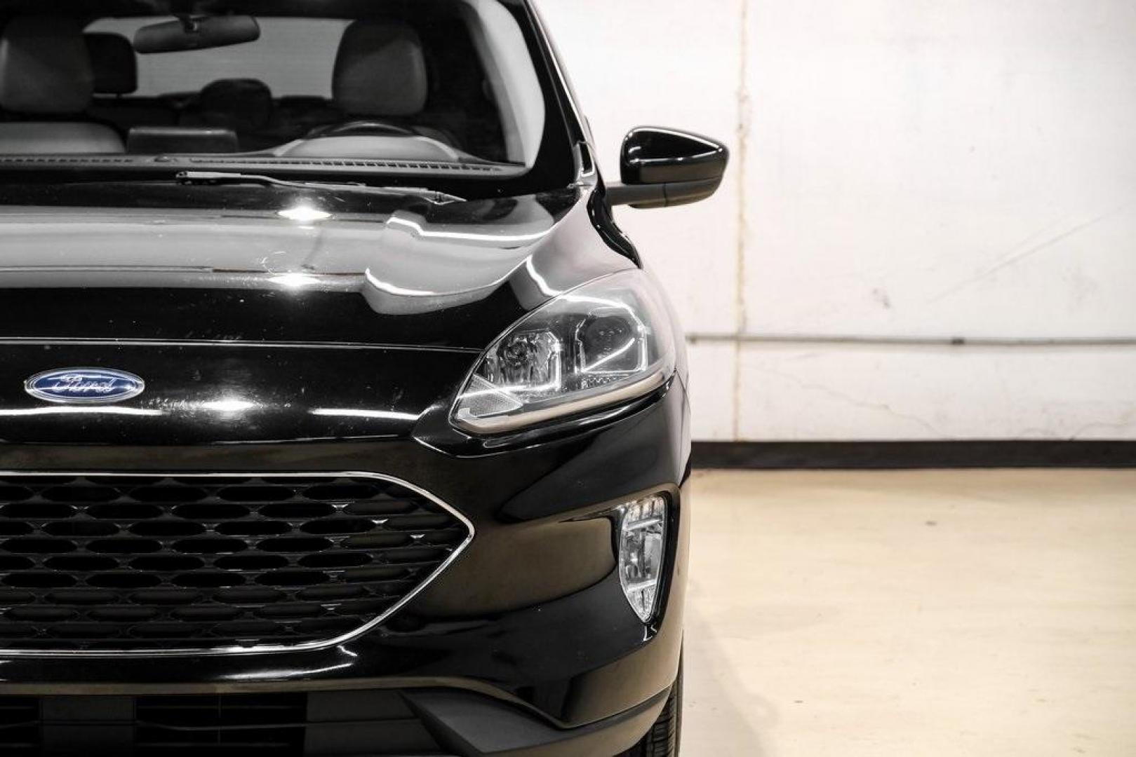 2021 Black Metallic /Sandstone Ford Escape SEL (1FMCU0H62MU) with an 1.5L EcoBoost engine, Automatic transmission, located at 15300 Midway Rd., Addison, TX, 75001, (972) 702-0011, 32.958321, -96.838074 - Photo#40