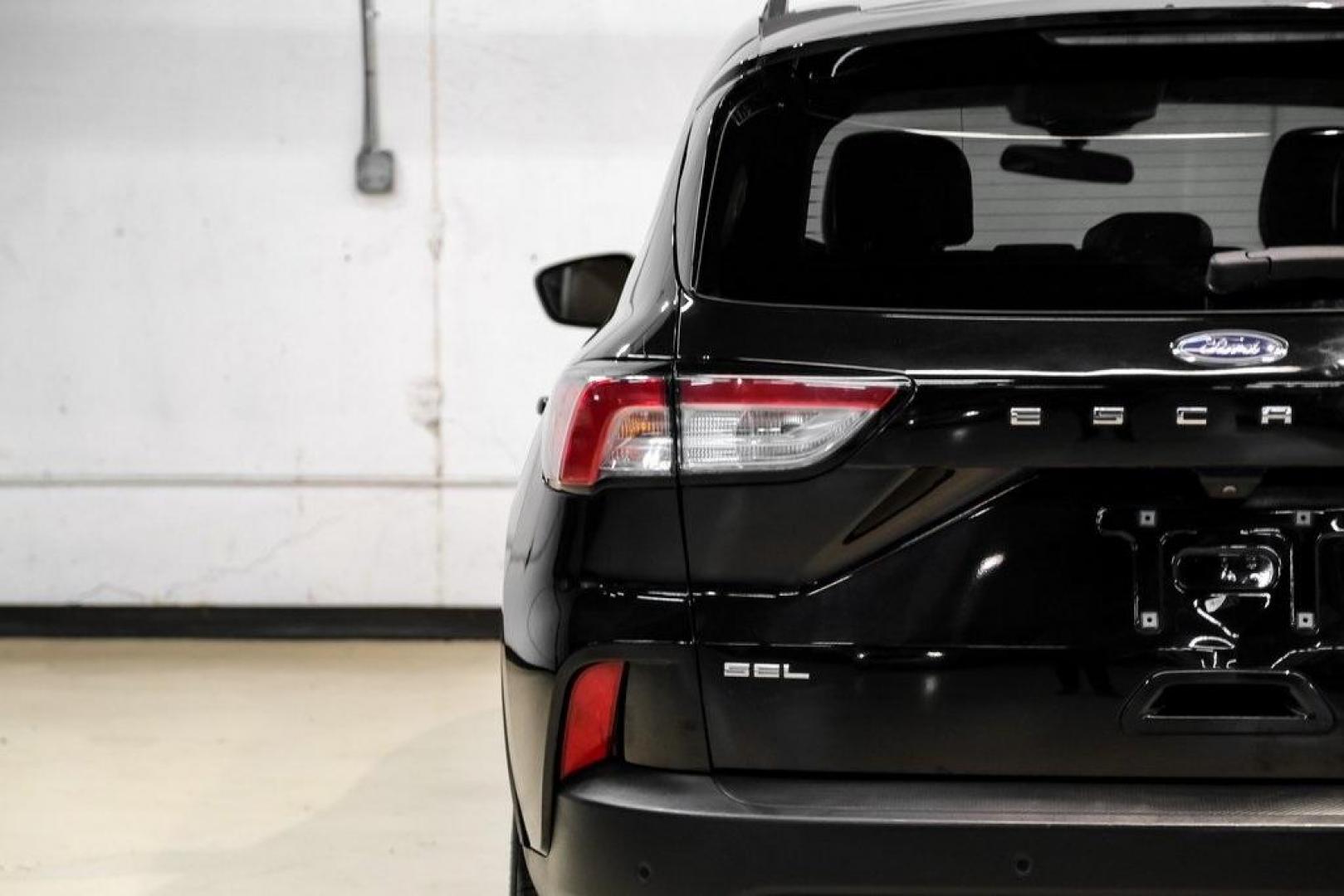 2021 Black Metallic /Sandstone Ford Escape SEL (1FMCU0H62MU) with an 1.5L EcoBoost engine, Automatic transmission, located at 15300 Midway Rd., Addison, TX, 75001, (972) 702-0011, 32.958321, -96.838074 - Photo#41