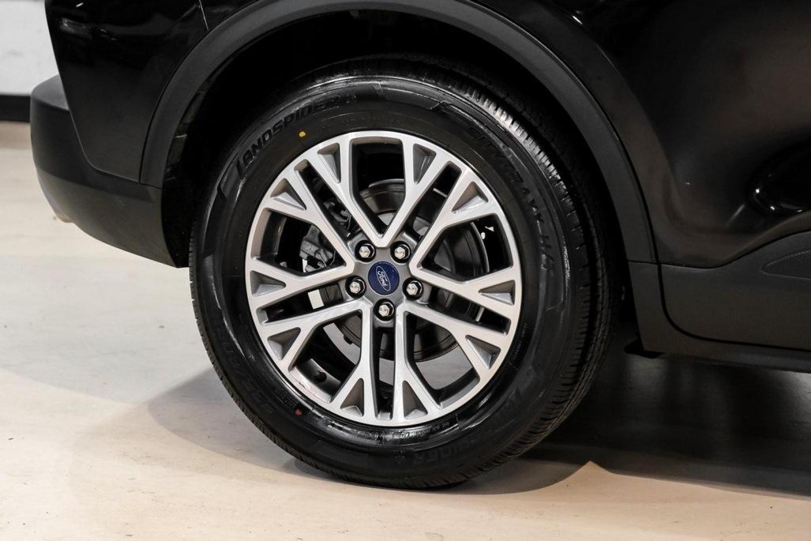 2021 Black Metallic /Sandstone Ford Escape SEL (1FMCU0H62MU) with an 1.5L EcoBoost engine, Automatic transmission, located at 15300 Midway Rd., Addison, TX, 75001, (972) 702-0011, 32.958321, -96.838074 - Photo#48