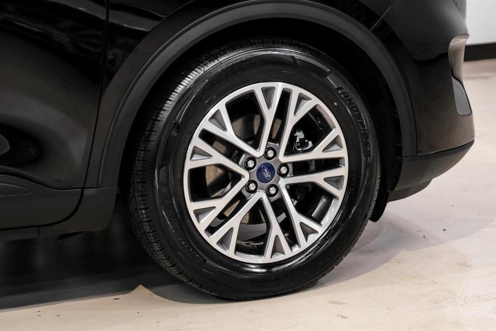 2021 Black Metallic /Sandstone Ford Escape SEL (1FMCU0H62MU) with an 1.5L EcoBoost engine, Automatic transmission, located at 15300 Midway Rd., Addison, TX, 75001, (972) 702-0011, 32.958321, -96.838074 - Photo#49