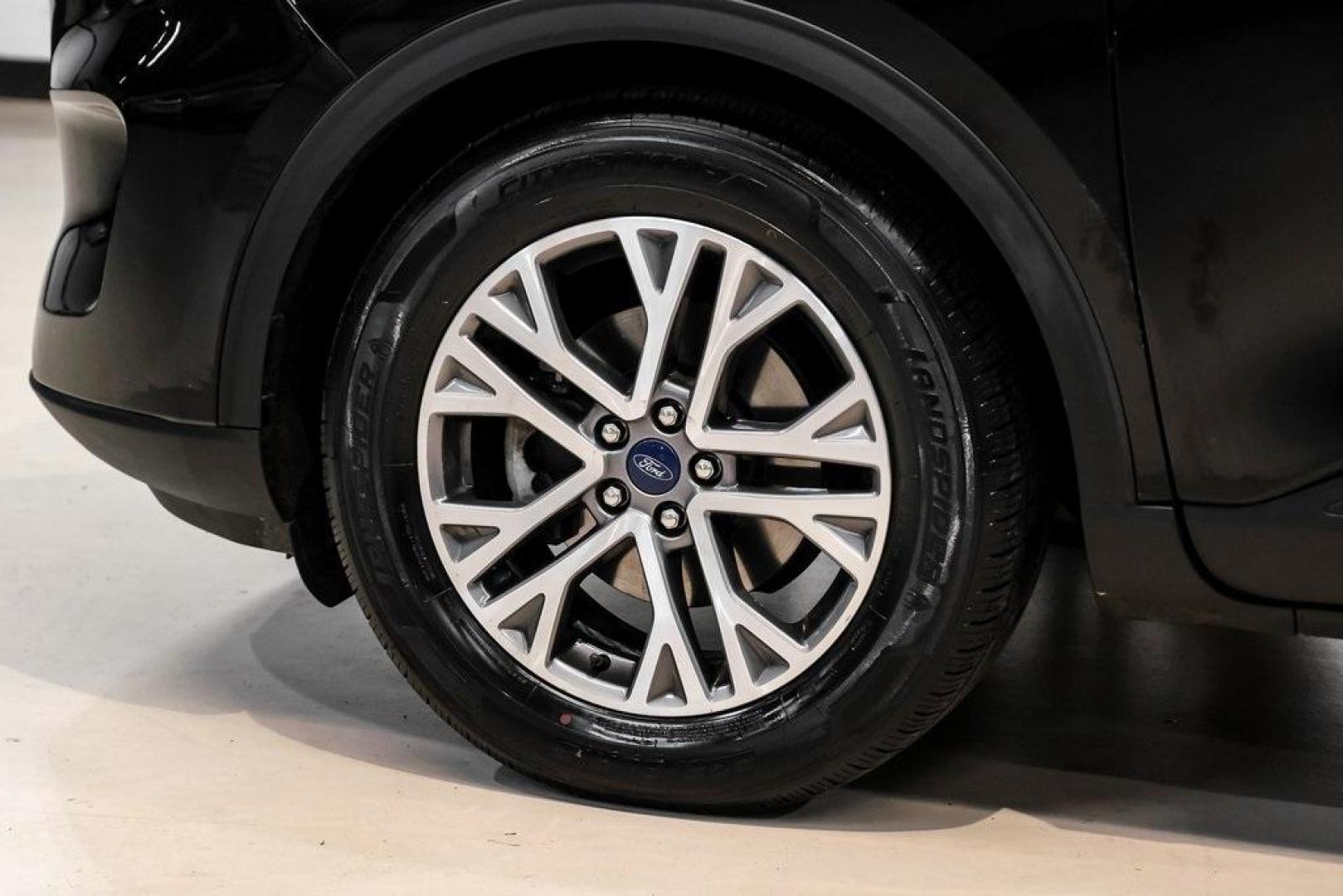 2021 Black Metallic /Sandstone Ford Escape SEL (1FMCU0H62MU) with an 1.5L EcoBoost engine, Automatic transmission, located at 15300 Midway Rd., Addison, TX, 75001, (972) 702-0011, 32.958321, -96.838074 - Photo#50