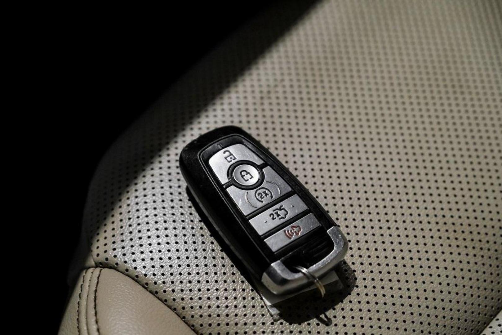 2021 Black Metallic /Sandstone Ford Escape SEL (1FMCU0H62MU) with an 1.5L EcoBoost engine, Automatic transmission, located at 15300 Midway Rd., Addison, TX, 75001, (972) 702-0011, 32.958321, -96.838074 - Photo#52