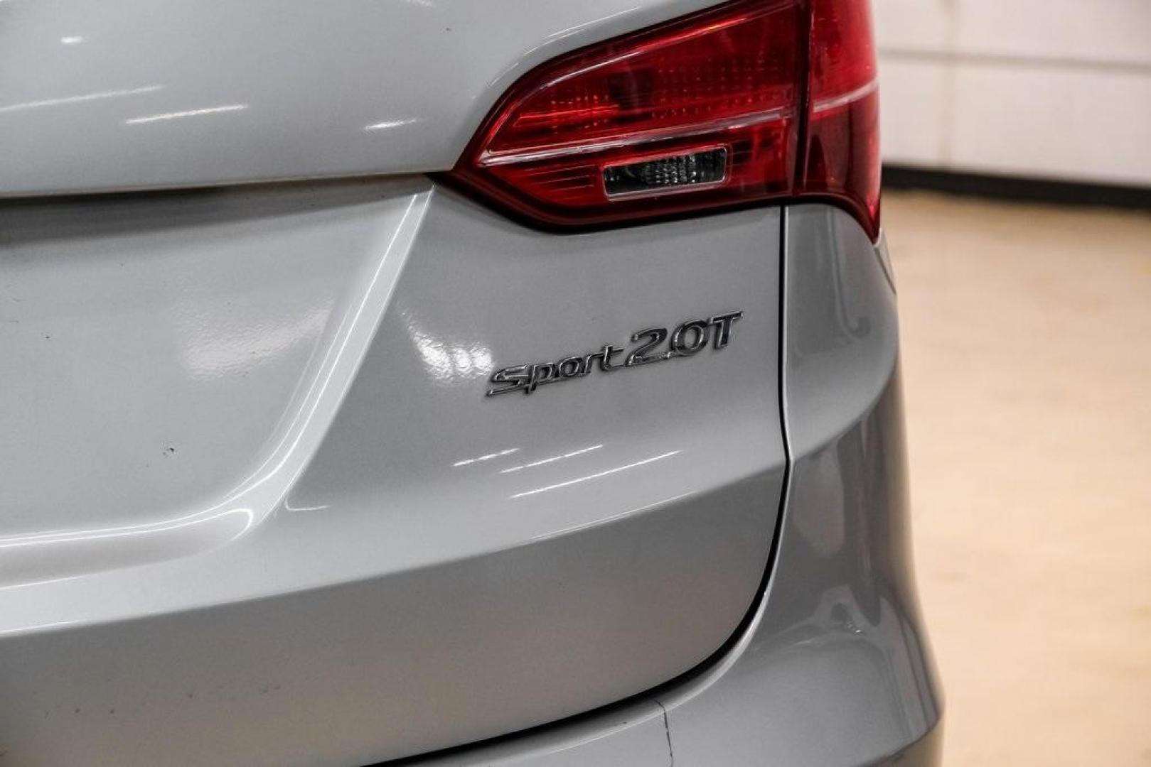 2013 Moonstone Silver /Gray Hyundai Santa Fe Sport 2.0L Turbo (5XYZW3LA7DG) with an 2.0L I4 DGI DOHC 16V Turbocharged engine, Automatic transmission, located at 15300 Midway Rd., Addison, TX, 75001, (972) 702-0011, 32.958321, -96.838074 - Photo#46