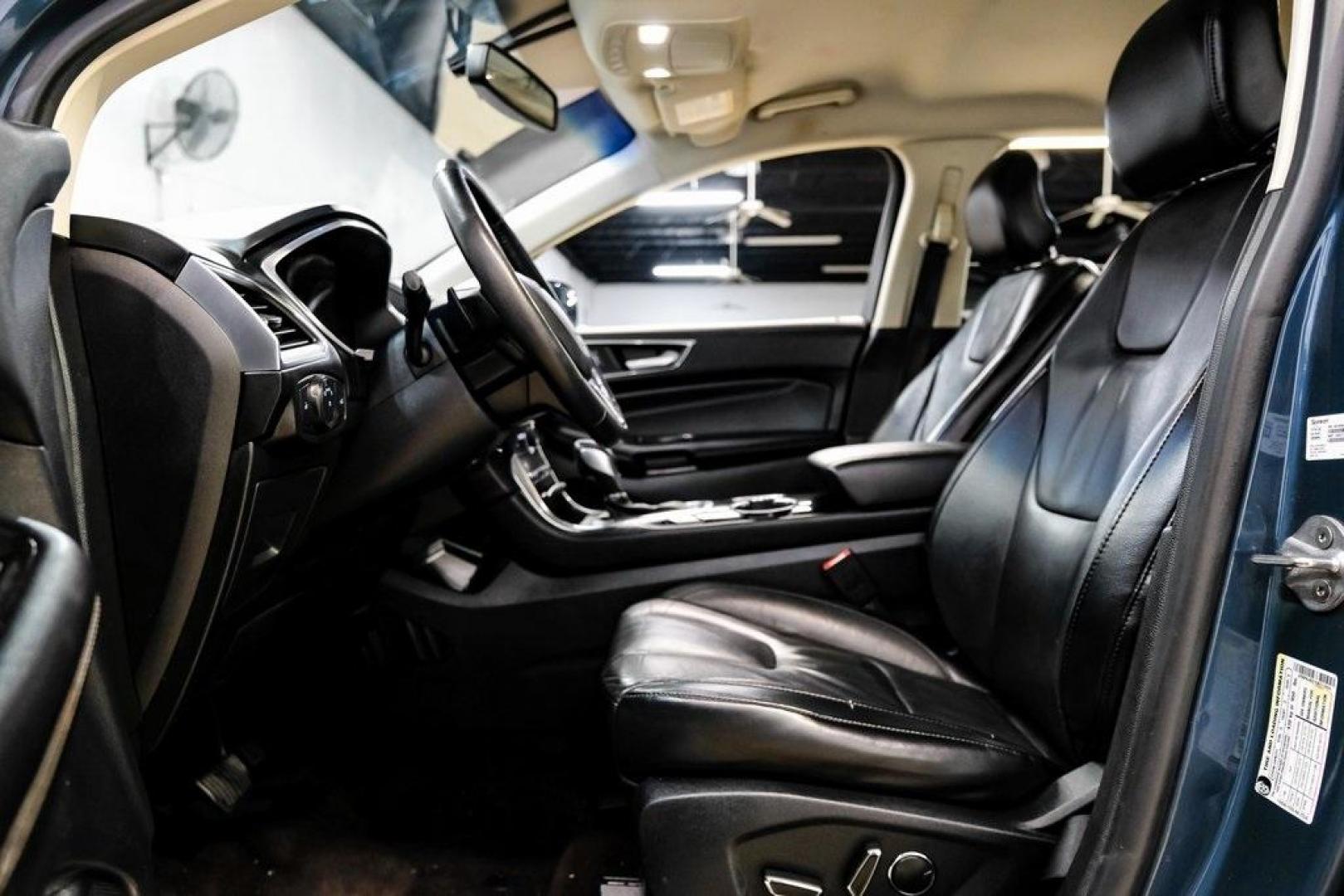 2016 Blue Metallic /Ebony Ford Edge Titanium (2FMPK4K87GB) with an 3.5L V6 Ti-VCT engine, Automatic transmission, located at 15300 Midway Rd., Addison, TX, 75001, (972) 702-0011, 32.958321, -96.838074 - 2016 Ford Edge Titanium AWD<br><br>Now Available at Midway Auto Group Addison, Texas<br><br>Refined, comfortable, and well-equipped, the 2016 Ford Edge Titanium AWD delivers a premium midsize SUV experience with modern technology, a quiet ride, and confident all-wheel-drive capability. As one of th - Photo#3