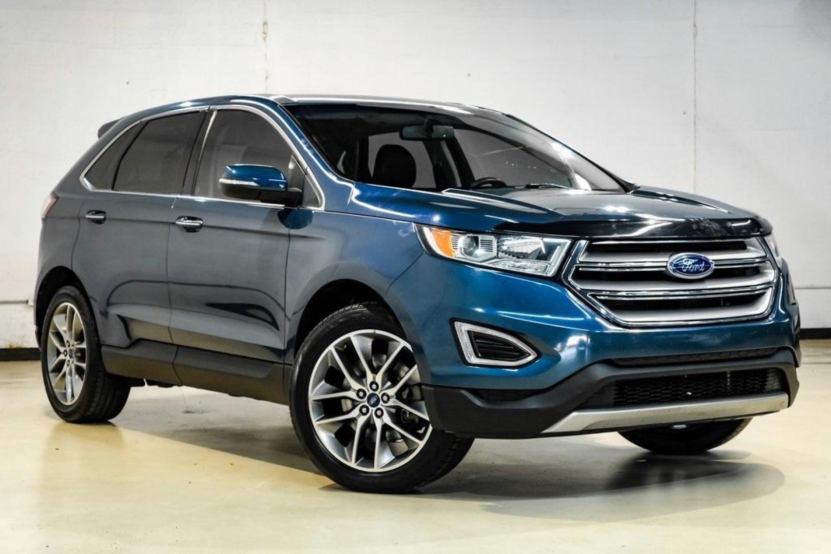 2016 Blue Metallic /Ebony Ford Edge Titanium (2FMPK4K87GB) with an 3.5L V6 Ti-VCT engine, Automatic transmission, located at 15300 Midway Rd., Addison, TX, 75001, (972) 702-0011, 32.958321, -96.838074 - 2016 Ford Edge Titanium AWD<br><br>Now Available at Midway Auto Group Addison, Texas<br><br>Refined, comfortable, and well-equipped, the 2016 Ford Edge Titanium AWD delivers a premium midsize SUV experience with modern technology, a quiet ride, and confident all-wheel-drive capability. As one of th - Photo#5