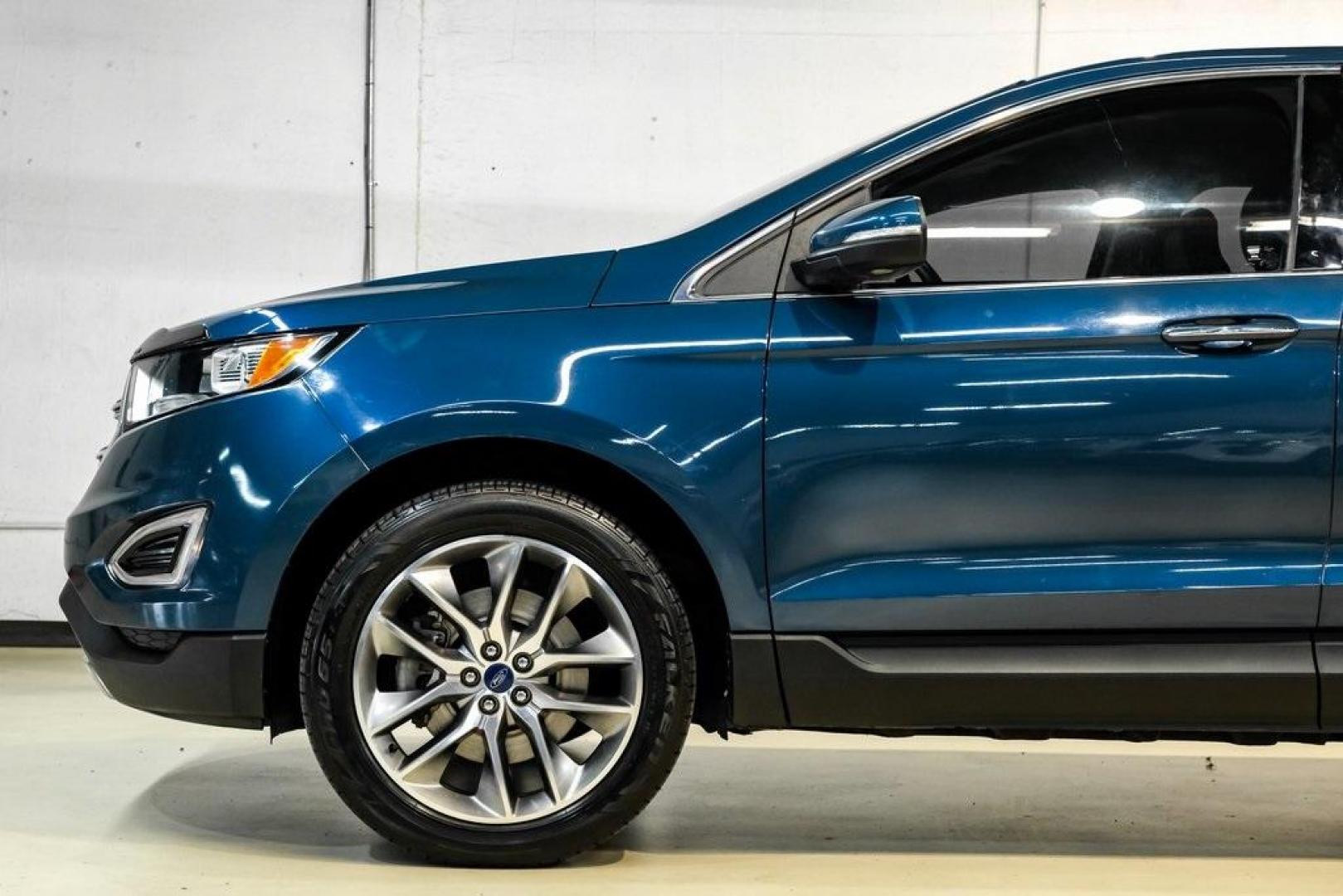 2016 Blue Metallic /Ebony Ford Edge Titanium (2FMPK4K87GB) with an 3.5L V6 Ti-VCT engine, Automatic transmission, located at 15300 Midway Rd., Addison, TX, 75001, (972) 702-0011, 32.958321, -96.838074 - 2016 Ford Edge Titanium AWD<br><br>Now Available at Midway Auto Group Addison, Texas<br><br>Refined, comfortable, and well-equipped, the 2016 Ford Edge Titanium AWD delivers a premium midsize SUV experience with modern technology, a quiet ride, and confident all-wheel-drive capability. As one of th - Photo#11