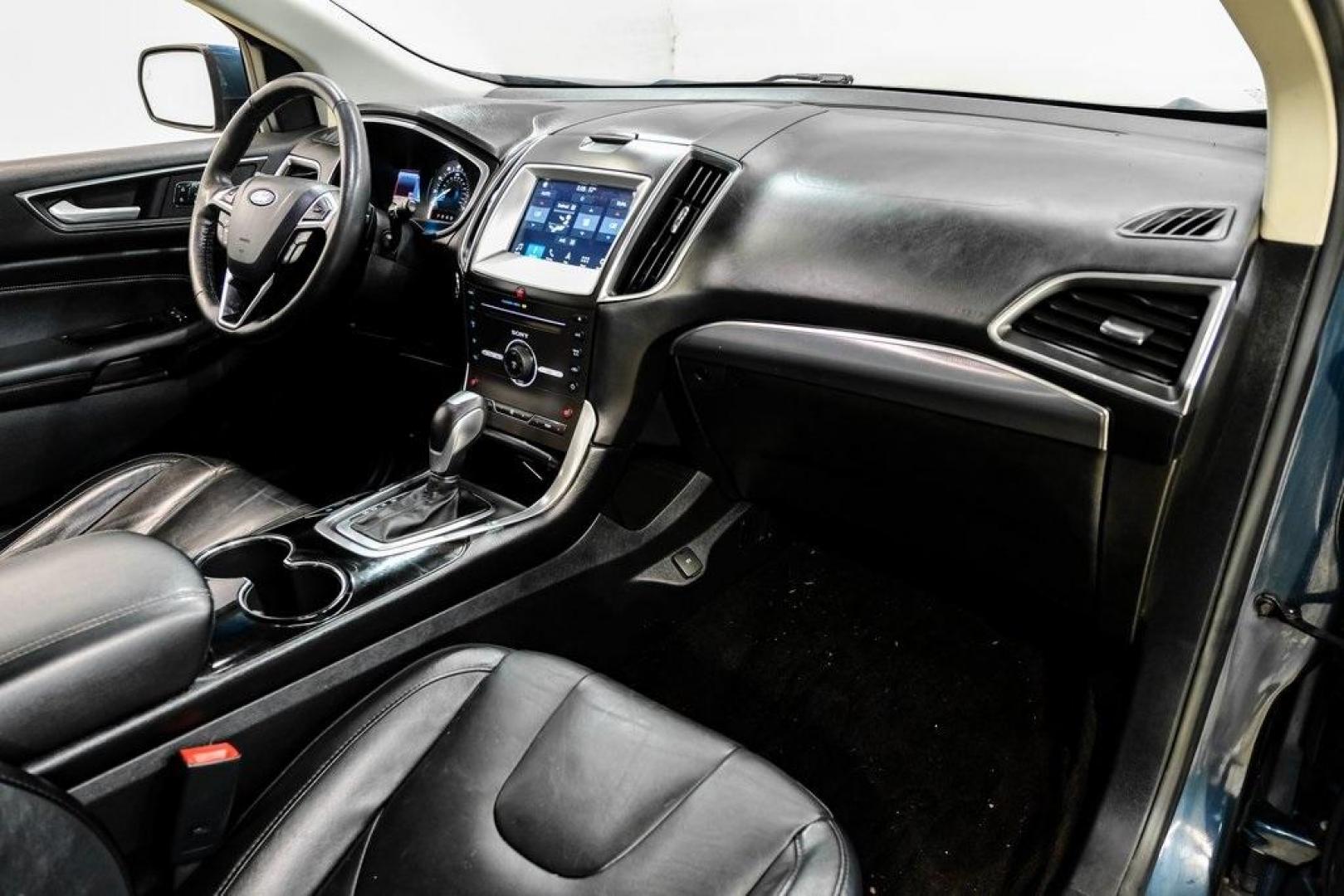 2016 Blue Metallic /Ebony Ford Edge Titanium (2FMPK4K87GB) with an 3.5L V6 Ti-VCT engine, Automatic transmission, located at 15300 Midway Rd., Addison, TX, 75001, (972) 702-0011, 32.958321, -96.838074 - 2016 Ford Edge Titanium AWD<br><br>Now Available at Midway Auto Group Addison, Texas<br><br>Refined, comfortable, and well-equipped, the 2016 Ford Edge Titanium AWD delivers a premium midsize SUV experience with modern technology, a quiet ride, and confident all-wheel-drive capability. As one of th - Photo#13