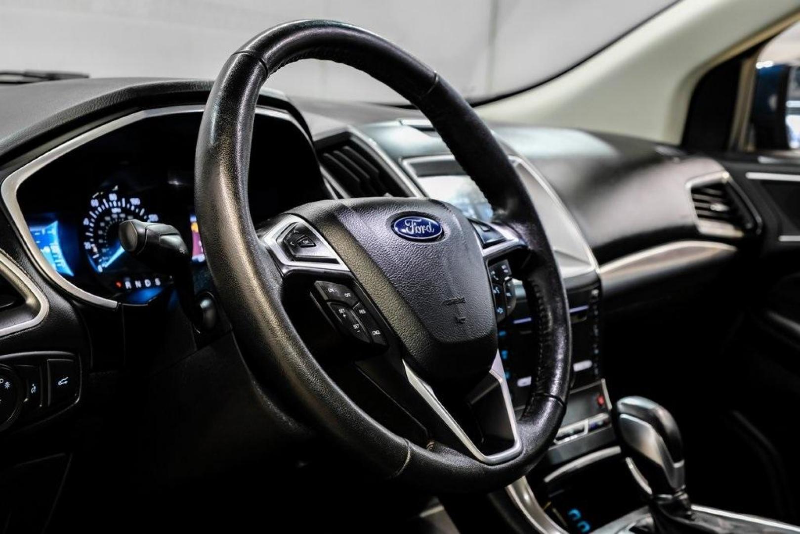 2016 Blue Metallic /Ebony Ford Edge Titanium (2FMPK4K87GB) with an 3.5L V6 Ti-VCT engine, Automatic transmission, located at 15300 Midway Rd., Addison, TX, 75001, (972) 702-0011, 32.958321, -96.838074 - 2016 Ford Edge Titanium AWD<br><br>Now Available at Midway Auto Group Addison, Texas<br><br>Refined, comfortable, and well-equipped, the 2016 Ford Edge Titanium AWD delivers a premium midsize SUV experience with modern technology, a quiet ride, and confident all-wheel-drive capability. As one of th - Photo#16