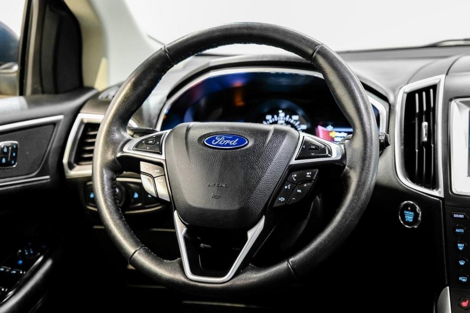 2016 Blue Metallic /Ebony Ford Edge Titanium (2FMPK4K87GB) with an 3.5L V6 Ti-VCT engine, Automatic transmission, located at 15300 Midway Rd., Addison, TX, 75001, (972) 702-0011, 32.958321, -96.838074 - 2016 Ford Edge Titanium AWD<br><br>Now Available at Midway Auto Group Addison, Texas<br><br>Refined, comfortable, and well-equipped, the 2016 Ford Edge Titanium AWD delivers a premium midsize SUV experience with modern technology, a quiet ride, and confident all-wheel-drive capability. As one of th - Photo#17