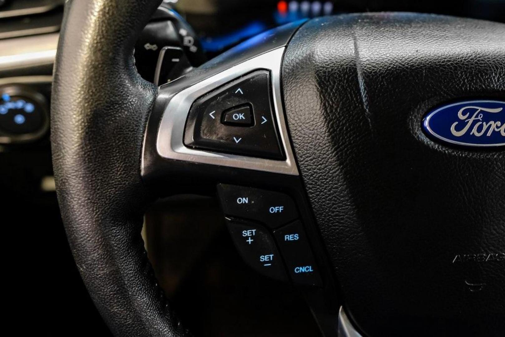 2016 Blue Metallic /Ebony Ford Edge Titanium (2FMPK4K87GB) with an 3.5L V6 Ti-VCT engine, Automatic transmission, located at 15300 Midway Rd., Addison, TX, 75001, (972) 702-0011, 32.958321, -96.838074 - 2016 Ford Edge Titanium AWD<br><br>Now Available at Midway Auto Group Addison, Texas<br><br>Refined, comfortable, and well-equipped, the 2016 Ford Edge Titanium AWD delivers a premium midsize SUV experience with modern technology, a quiet ride, and confident all-wheel-drive capability. As one of th - Photo#18