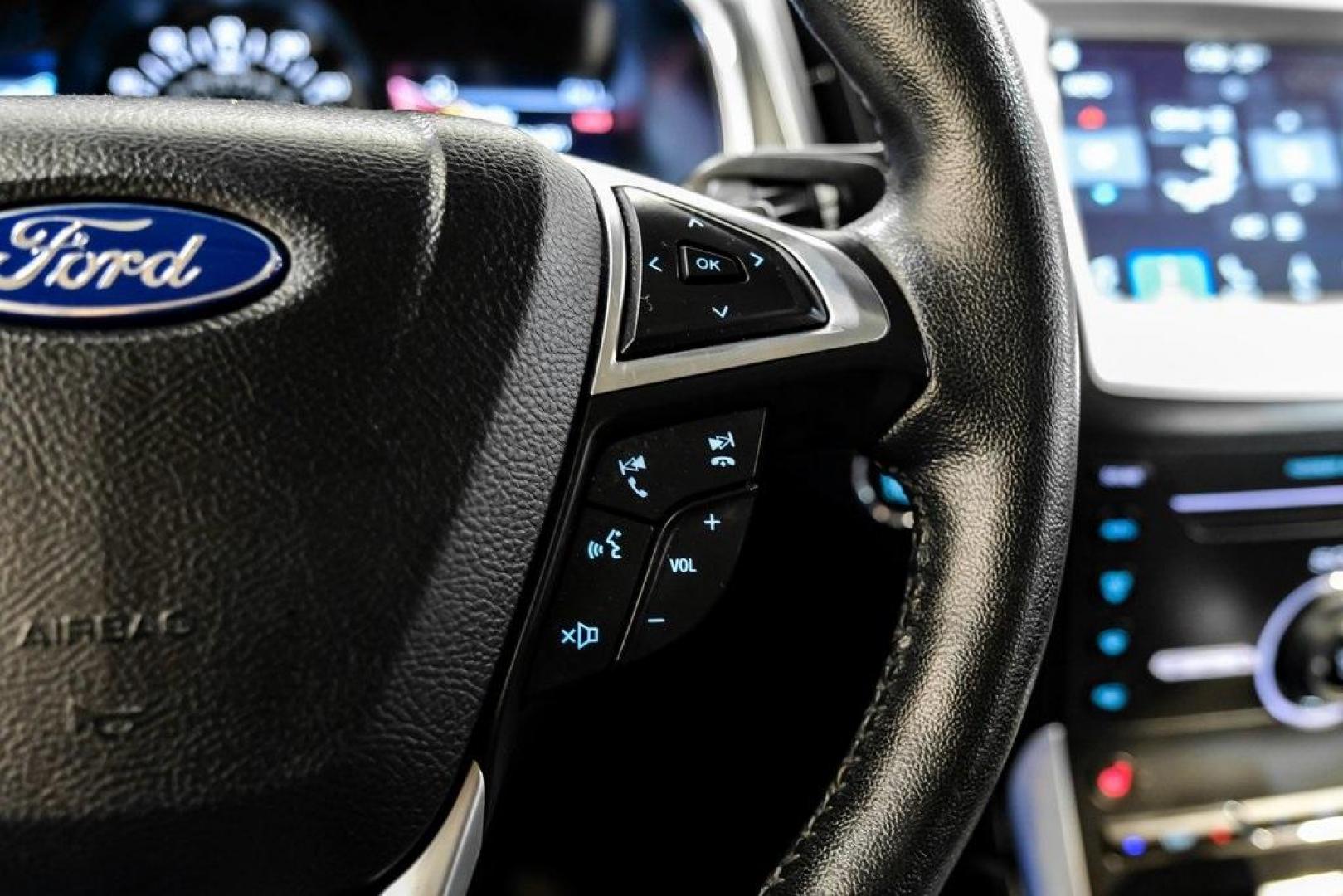 2016 Blue Metallic /Ebony Ford Edge Titanium (2FMPK4K87GB) with an 3.5L V6 Ti-VCT engine, Automatic transmission, located at 15300 Midway Rd., Addison, TX, 75001, (972) 702-0011, 32.958321, -96.838074 - 2016 Ford Edge Titanium AWD<br><br>Now Available at Midway Auto Group Addison, Texas<br><br>Refined, comfortable, and well-equipped, the 2016 Ford Edge Titanium AWD delivers a premium midsize SUV experience with modern technology, a quiet ride, and confident all-wheel-drive capability. As one of th - Photo#19