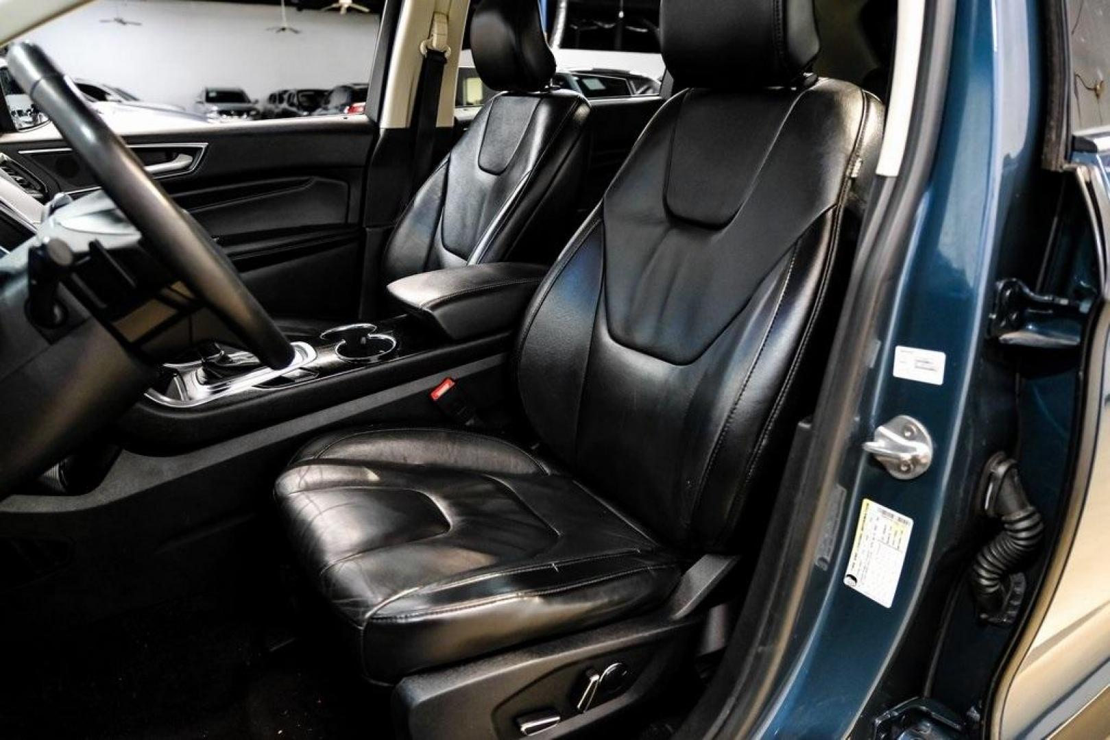 2016 Blue Metallic /Ebony Ford Edge Titanium (2FMPK4K87GB) with an 3.5L V6 Ti-VCT engine, Automatic transmission, located at 15300 Midway Rd., Addison, TX, 75001, (972) 702-0011, 32.958321, -96.838074 - 2016 Ford Edge Titanium AWD<br><br>Now Available at Midway Auto Group Addison, Texas<br><br>Refined, comfortable, and well-equipped, the 2016 Ford Edge Titanium AWD delivers a premium midsize SUV experience with modern technology, a quiet ride, and confident all-wheel-drive capability. As one of th - Photo#39