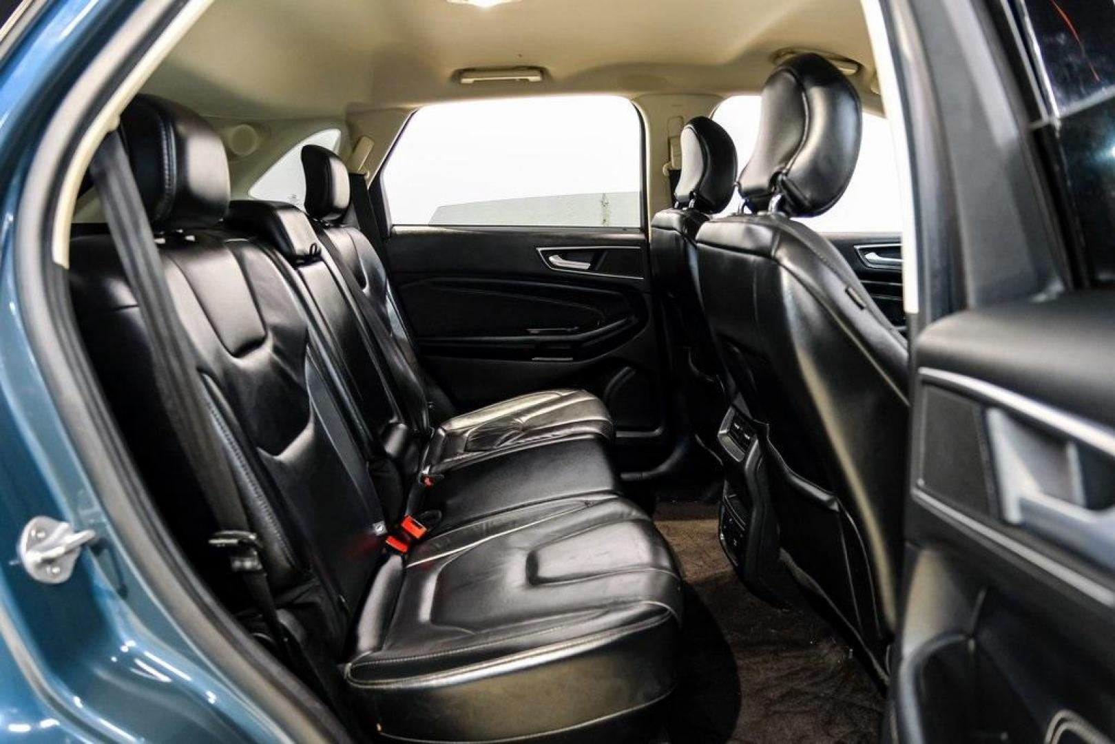 2016 Blue Metallic /Ebony Ford Edge Titanium (2FMPK4K87GB) with an 3.5L V6 Ti-VCT engine, Automatic transmission, located at 15300 Midway Rd., Addison, TX, 75001, (972) 702-0011, 32.958321, -96.838074 - 2016 Ford Edge Titanium AWD<br><br>Now Available at Midway Auto Group Addison, Texas<br><br>Refined, comfortable, and well-equipped, the 2016 Ford Edge Titanium AWD delivers a premium midsize SUV experience with modern technology, a quiet ride, and confident all-wheel-drive capability. As one of th - Photo#44