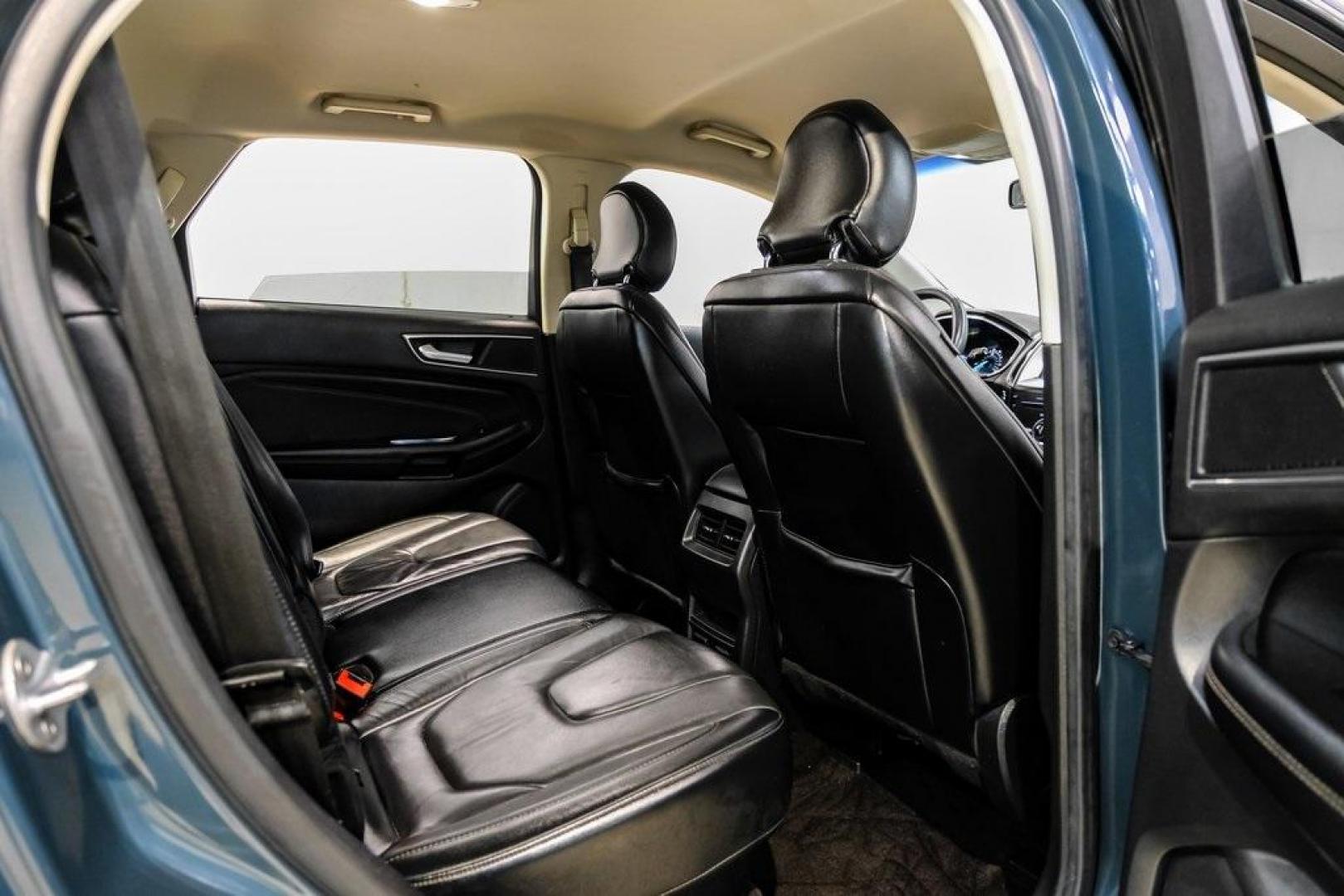 2016 Blue Metallic /Ebony Ford Edge Titanium (2FMPK4K87GB) with an 3.5L V6 Ti-VCT engine, Automatic transmission, located at 15300 Midway Rd., Addison, TX, 75001, (972) 702-0011, 32.958321, -96.838074 - 2016 Ford Edge Titanium AWD<br><br>Now Available at Midway Auto Group Addison, Texas<br><br>Refined, comfortable, and well-equipped, the 2016 Ford Edge Titanium AWD delivers a premium midsize SUV experience with modern technology, a quiet ride, and confident all-wheel-drive capability. As one of th - Photo#45