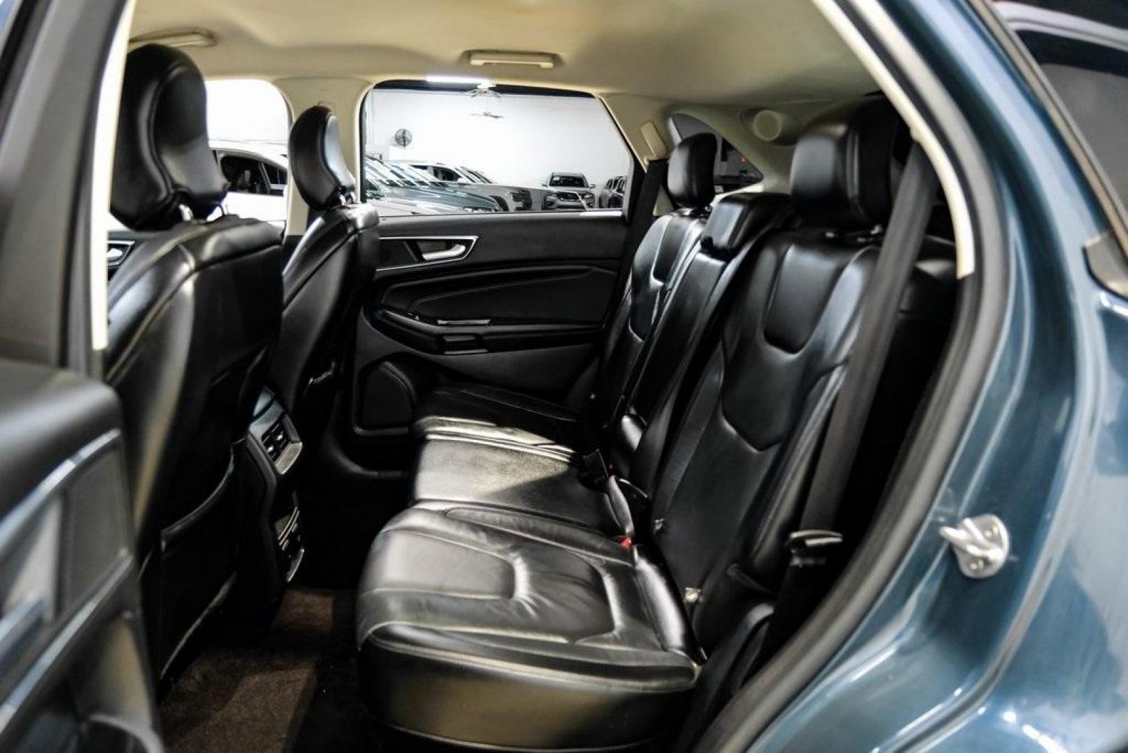 2016 Blue Metallic /Ebony Ford Edge Titanium (2FMPK4K87GB) with an 3.5L V6 Ti-VCT engine, Automatic transmission, located at 15300 Midway Rd., Addison, TX, 75001, (972) 702-0011, 32.958321, -96.838074 - 2016 Ford Edge Titanium AWD<br><br>Now Available at Midway Auto Group Addison, Texas<br><br>Refined, comfortable, and well-equipped, the 2016 Ford Edge Titanium AWD delivers a premium midsize SUV experience with modern technology, a quiet ride, and confident all-wheel-drive capability. As one of th - Photo#47