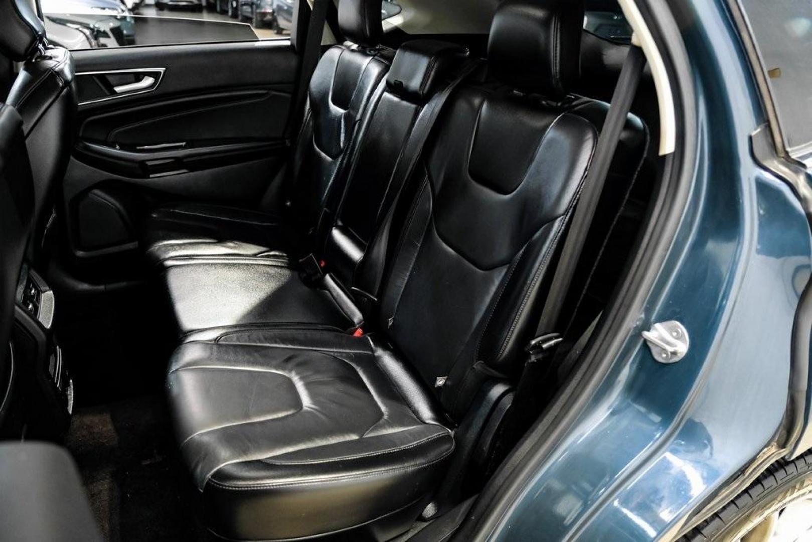 2016 Blue Metallic /Ebony Ford Edge Titanium (2FMPK4K87GB) with an 3.5L V6 Ti-VCT engine, Automatic transmission, located at 15300 Midway Rd., Addison, TX, 75001, (972) 702-0011, 32.958321, -96.838074 - 2016 Ford Edge Titanium AWD<br><br>Now Available at Midway Auto Group Addison, Texas<br><br>Refined, comfortable, and well-equipped, the 2016 Ford Edge Titanium AWD delivers a premium midsize SUV experience with modern technology, a quiet ride, and confident all-wheel-drive capability. As one of th - Photo#48