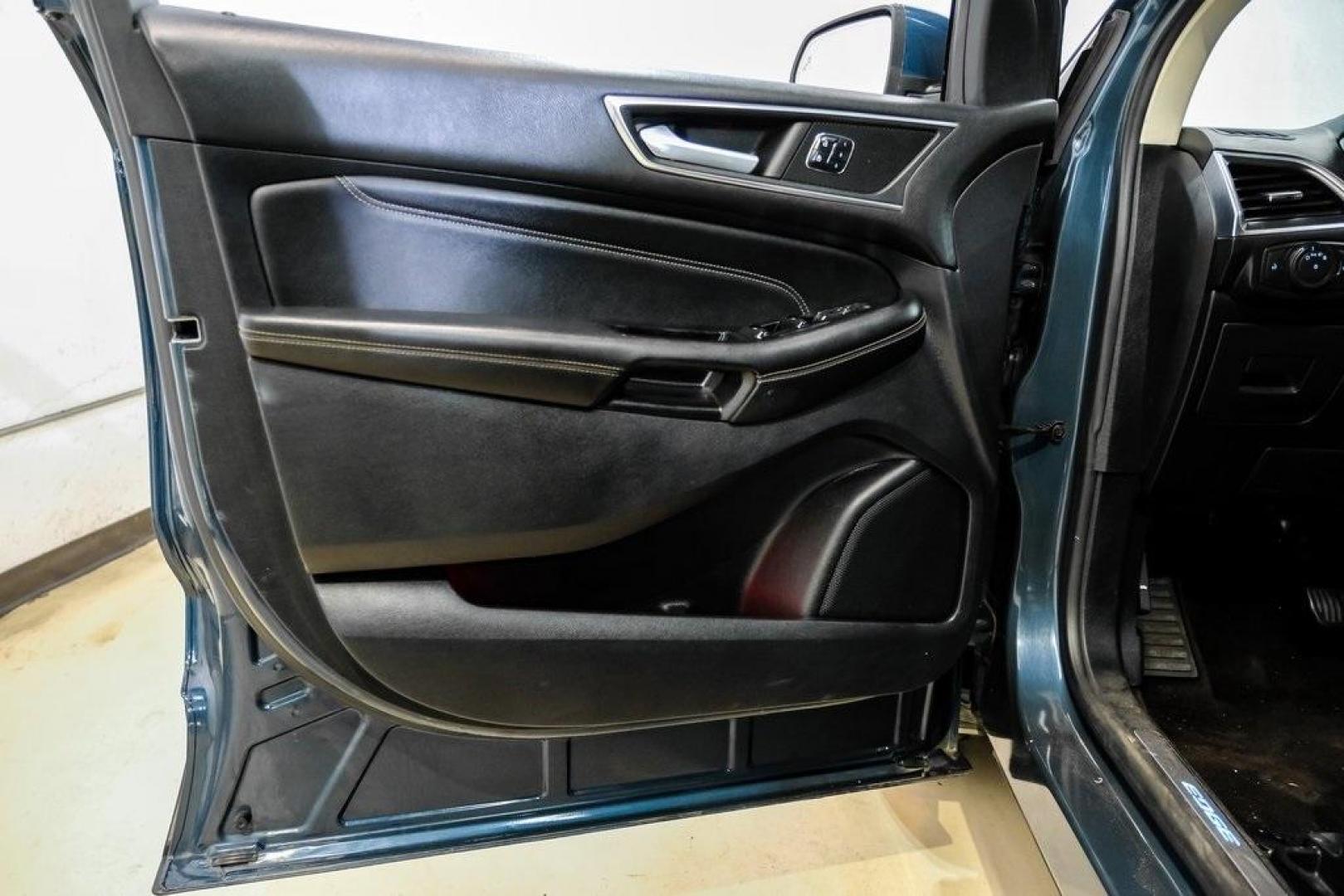 2016 Blue Metallic /Ebony Ford Edge Titanium (2FMPK4K87GB) with an 3.5L V6 Ti-VCT engine, Automatic transmission, located at 15300 Midway Rd., Addison, TX, 75001, (972) 702-0011, 32.958321, -96.838074 - 2016 Ford Edge Titanium AWD<br><br>Now Available at Midway Auto Group Addison, Texas<br><br>Refined, comfortable, and well-equipped, the 2016 Ford Edge Titanium AWD delivers a premium midsize SUV experience with modern technology, a quiet ride, and confident all-wheel-drive capability. As one of th - Photo#51