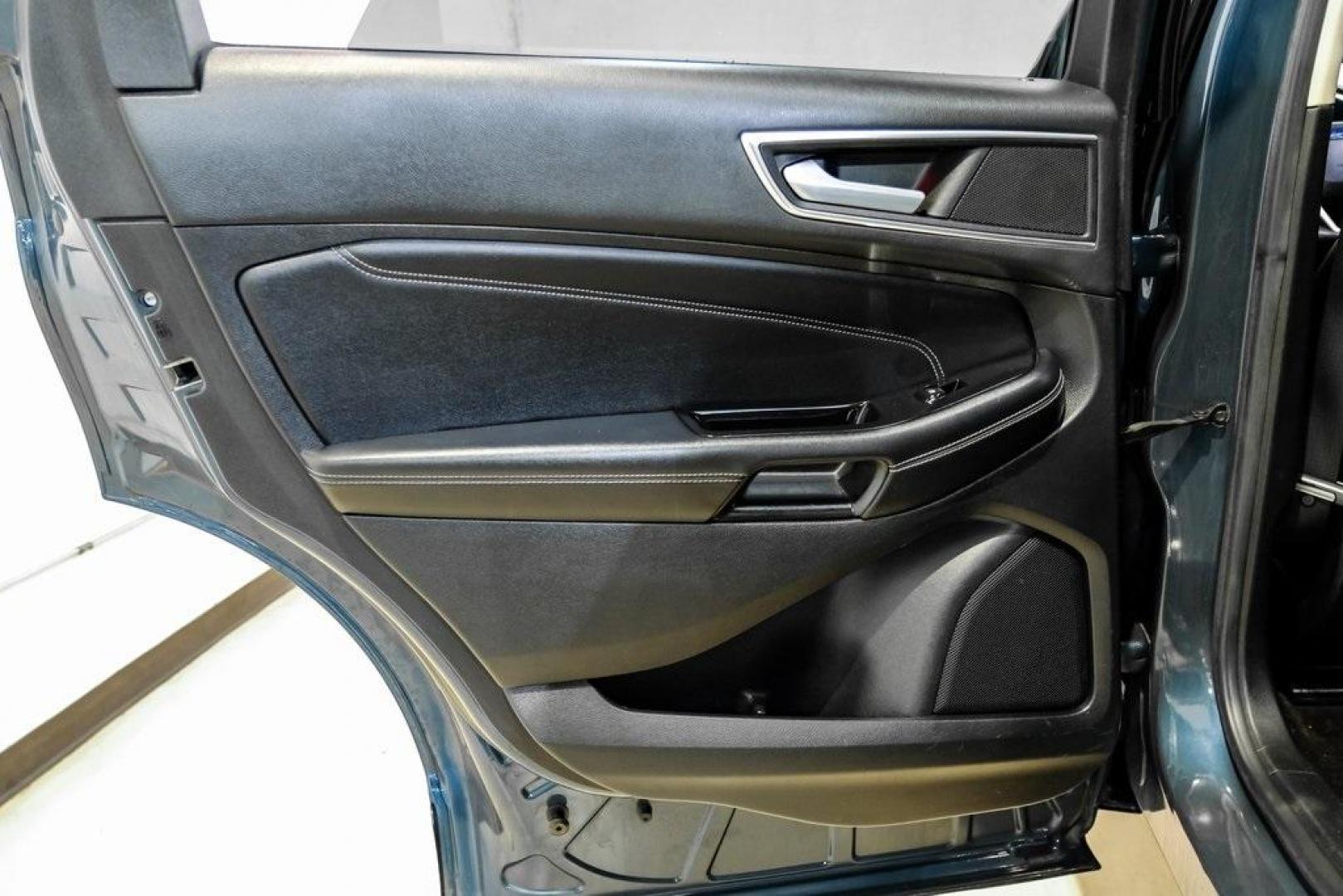 2016 Blue Metallic /Ebony Ford Edge Titanium (2FMPK4K87GB) with an 3.5L V6 Ti-VCT engine, Automatic transmission, located at 15300 Midway Rd., Addison, TX, 75001, (972) 702-0011, 32.958321, -96.838074 - 2016 Ford Edge Titanium AWD<br><br>Now Available at Midway Auto Group Addison, Texas<br><br>Refined, comfortable, and well-equipped, the 2016 Ford Edge Titanium AWD delivers a premium midsize SUV experience with modern technology, a quiet ride, and confident all-wheel-drive capability. As one of th - Photo#53