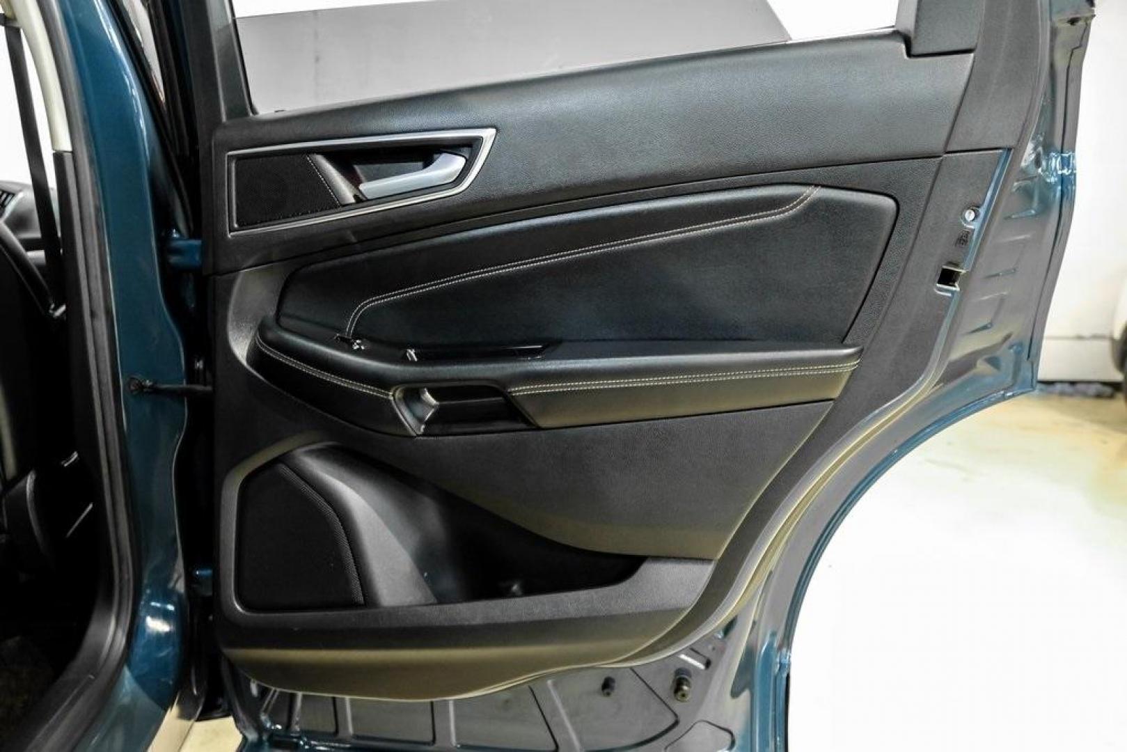 2016 Blue Metallic /Ebony Ford Edge Titanium (2FMPK4K87GB) with an 3.5L V6 Ti-VCT engine, Automatic transmission, located at 15300 Midway Rd., Addison, TX, 75001, (972) 702-0011, 32.958321, -96.838074 - 2016 Ford Edge Titanium AWD<br><br>Now Available at Midway Auto Group Addison, Texas<br><br>Refined, comfortable, and well-equipped, the 2016 Ford Edge Titanium AWD delivers a premium midsize SUV experience with modern technology, a quiet ride, and confident all-wheel-drive capability. As one of th - Photo#54