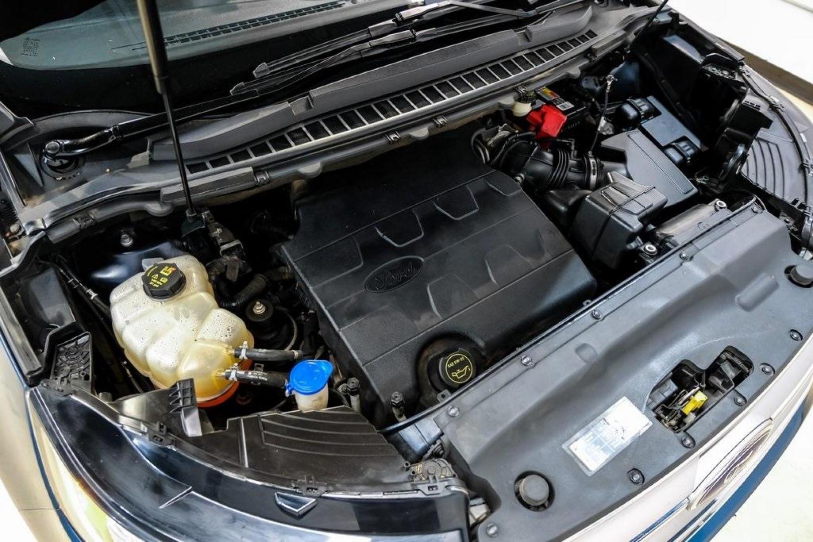 2016 Blue Metallic /Ebony Ford Edge Titanium (2FMPK4K87GB) with an 3.5L V6 Ti-VCT engine, Automatic transmission, located at 15300 Midway Rd., Addison, TX, 75001, (972) 702-0011, 32.958321, -96.838074 - 2016 Ford Edge Titanium AWD<br><br>Now Available at Midway Auto Group Addison, Texas<br><br>Refined, comfortable, and well-equipped, the 2016 Ford Edge Titanium AWD delivers a premium midsize SUV experience with modern technology, a quiet ride, and confident all-wheel-drive capability. As one of th - Photo#61