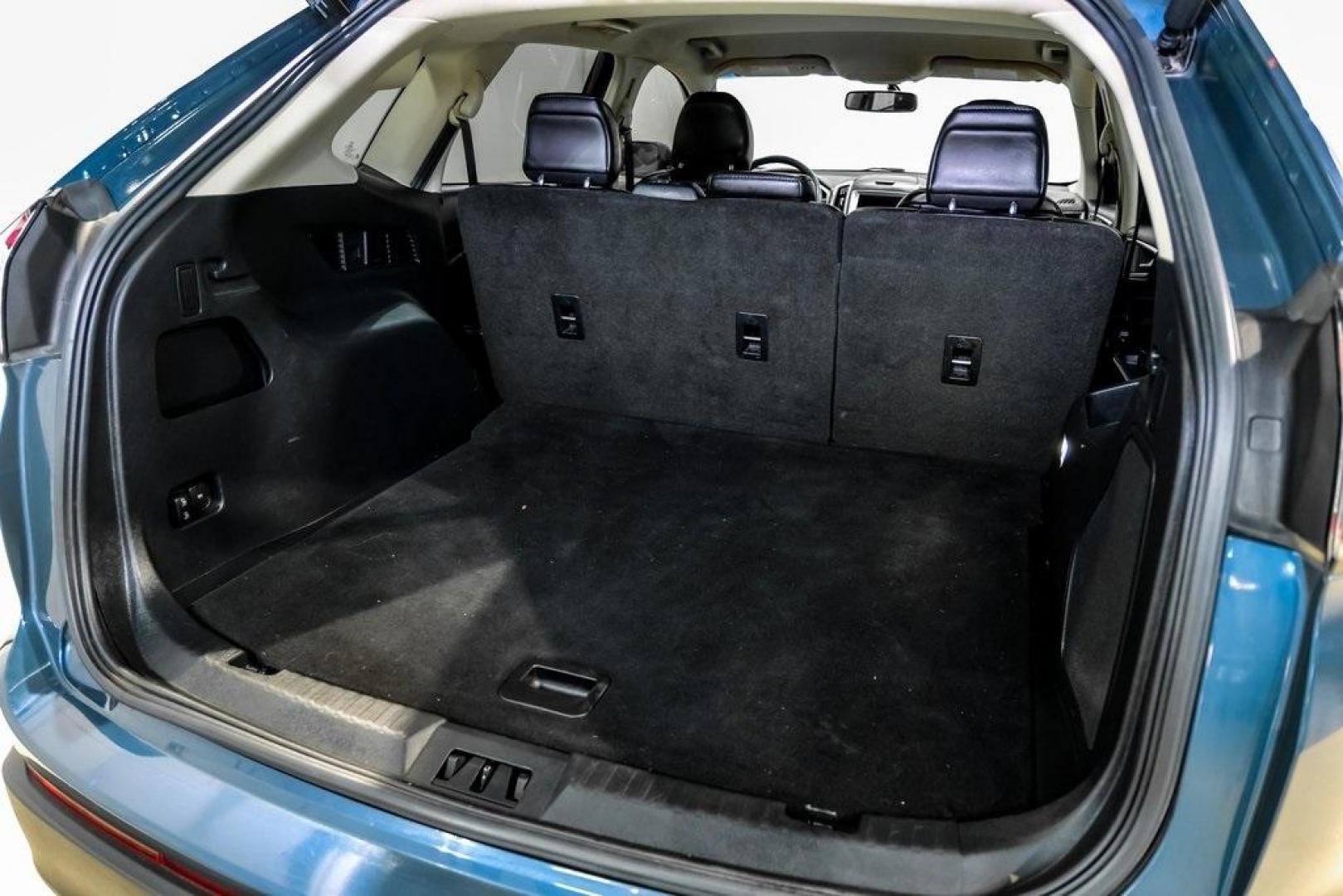 2016 Blue Metallic /Ebony Ford Edge Titanium (2FMPK4K87GB) with an 3.5L V6 Ti-VCT engine, Automatic transmission, located at 15300 Midway Rd., Addison, TX, 75001, (972) 702-0011, 32.958321, -96.838074 - 2016 Ford Edge Titanium AWD<br><br>Now Available at Midway Auto Group Addison, Texas<br><br>Refined, comfortable, and well-equipped, the 2016 Ford Edge Titanium AWD delivers a premium midsize SUV experience with modern technology, a quiet ride, and confident all-wheel-drive capability. As one of th - Photo#62