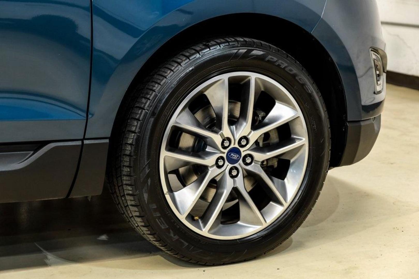 2016 Blue Metallic /Ebony Ford Edge Titanium (2FMPK4K87GB) with an 3.5L V6 Ti-VCT engine, Automatic transmission, located at 15300 Midway Rd., Addison, TX, 75001, (972) 702-0011, 32.958321, -96.838074 - 2016 Ford Edge Titanium AWD<br><br>Now Available at Midway Auto Group Addison, Texas<br><br>Refined, comfortable, and well-equipped, the 2016 Ford Edge Titanium AWD delivers a premium midsize SUV experience with modern technology, a quiet ride, and confident all-wheel-drive capability. As one of th - Photo#67