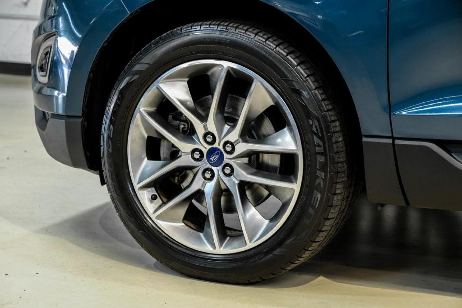 2016 Blue Metallic /Ebony Ford Edge Titanium (2FMPK4K87GB) with an 3.5L V6 Ti-VCT engine, Automatic transmission, located at 15300 Midway Rd., Addison, TX, 75001, (972) 702-0011, 32.958321, -96.838074 - 2016 Ford Edge Titanium AWD<br><br>Now Available at Midway Auto Group Addison, Texas<br><br>Refined, comfortable, and well-equipped, the 2016 Ford Edge Titanium AWD delivers a premium midsize SUV experience with modern technology, a quiet ride, and confident all-wheel-drive capability. As one of th - Photo#68