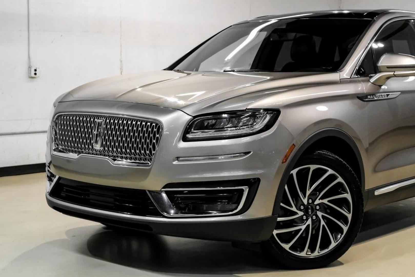 2019 Mocha /Ebony Lincoln Nautilus Reserve (2LMPJ6L98KB) with an 2.0L Turbocharged engine, Automatic transmission, located at 15300 Midway Rd., Addison, TX, 75001, (972) 702-0011, 32.958321, -96.838074 - 2019 Lincoln Nautilus Reserve<br><br>Now Available at Midway Auto Group, Addison, Texas<br><br>Luxurious, powerful, and exceptionally refined the 2019 Lincoln Nautilus Reserve represents the peak of Lincoln's midsize SUV craftsmanship. With its premium interior materials, smooth twin-turbocharged pe - Photo#5