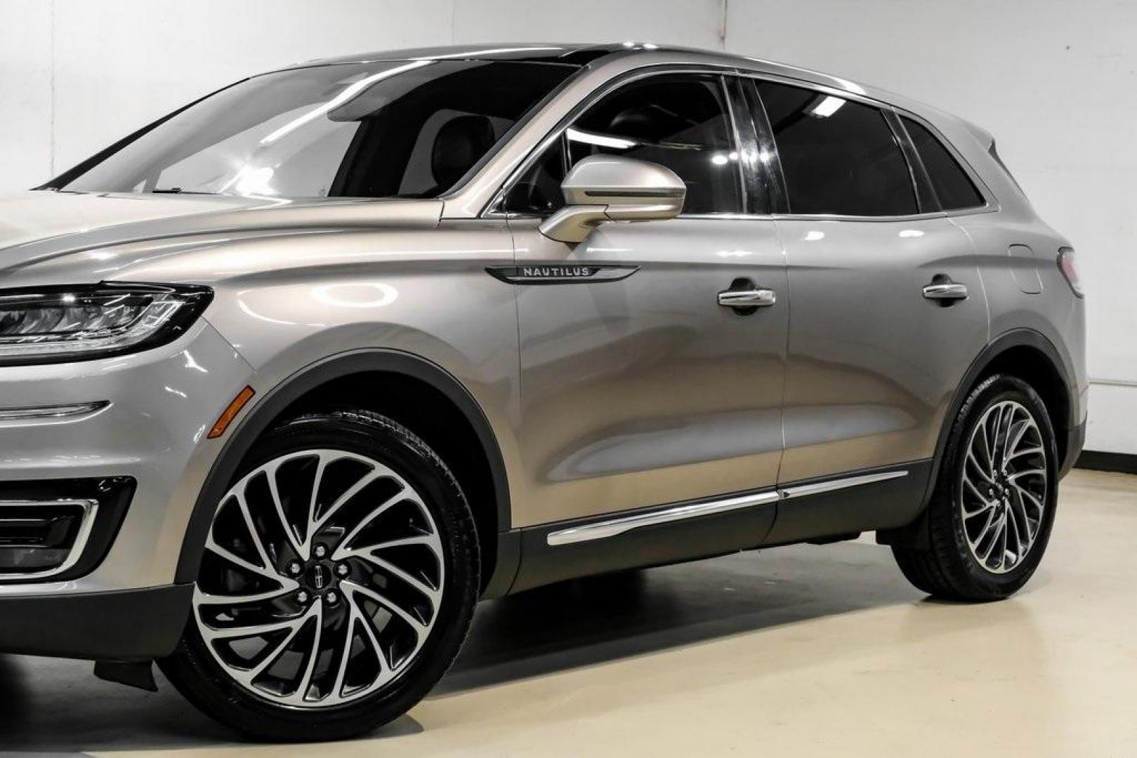 2019 Mocha /Ebony Lincoln Nautilus Reserve (2LMPJ6L98KB) with an 2.0L Turbocharged engine, Automatic transmission, located at 15300 Midway Rd., Addison, TX, 75001, (972) 702-0011, 32.958321, -96.838074 - 2019 Lincoln Nautilus Reserve<br><br>Now Available at Midway Auto Group, Addison, Texas<br><br>Luxurious, powerful, and exceptionally refined the 2019 Lincoln Nautilus Reserve represents the peak of Lincoln's midsize SUV craftsmanship. With its premium interior materials, smooth twin-turbocharged pe - Photo#6