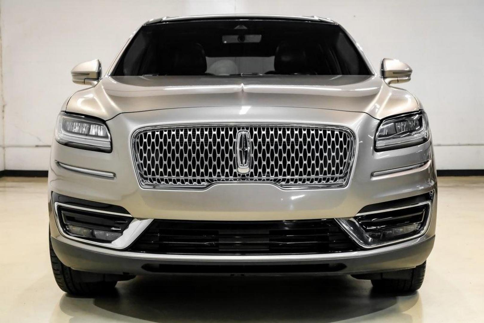 2019 Mocha /Ebony Lincoln Nautilus Reserve (2LMPJ6L98KB) with an 2.0L Turbocharged engine, Automatic transmission, located at 15300 Midway Rd., Addison, TX, 75001, (972) 702-0011, 32.958321, -96.838074 - 2019 Lincoln Nautilus Reserve<br><br>Now Available at Midway Auto Group, Addison, Texas<br><br>Luxurious, powerful, and exceptionally refined the 2019 Lincoln Nautilus Reserve represents the peak of Lincoln's midsize SUV craftsmanship. With its premium interior materials, smooth twin-turbocharged pe - Photo#7